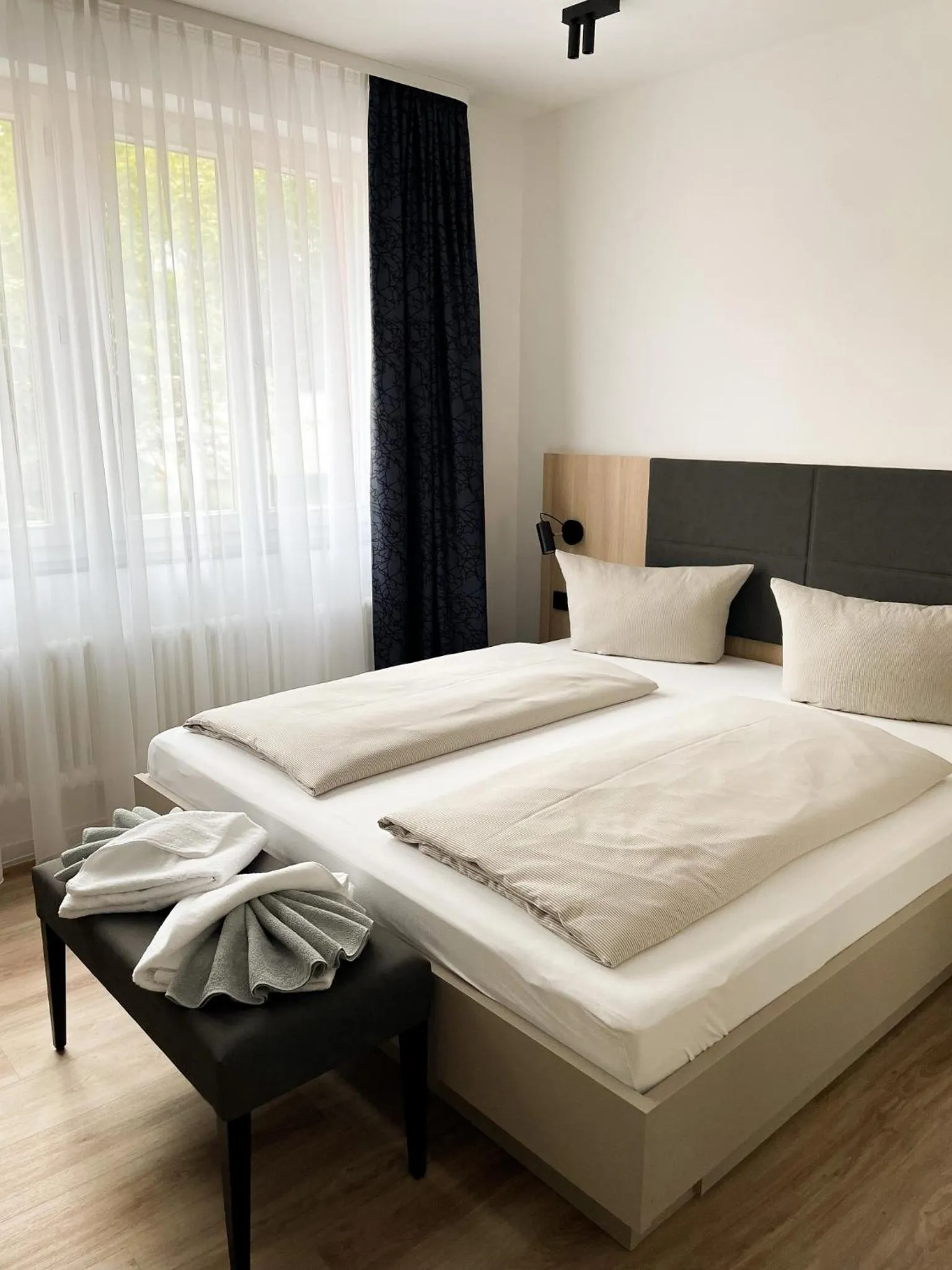 Bed in HOLI City Apart Hotel Berlin