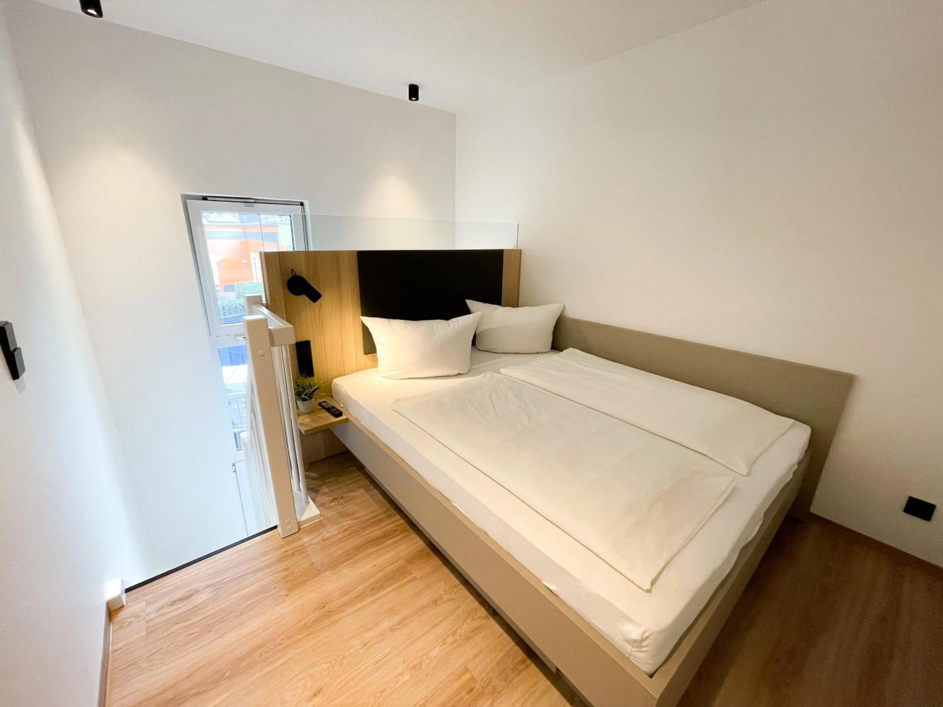 Bed in HOLI City Apart Hotel Berlin