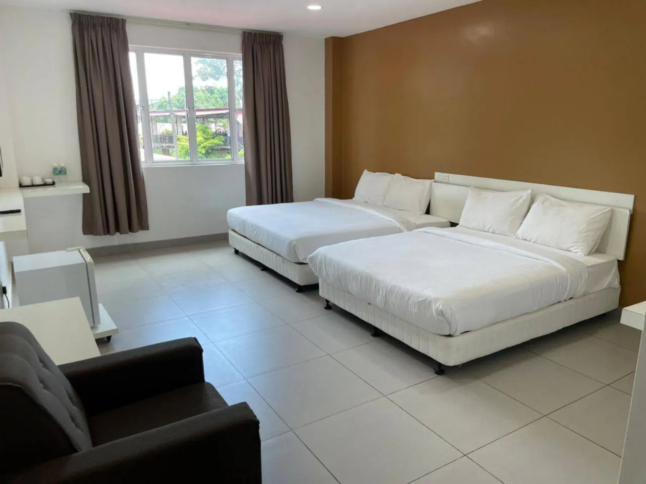 Bed in Melati Tanjong Beach Resort