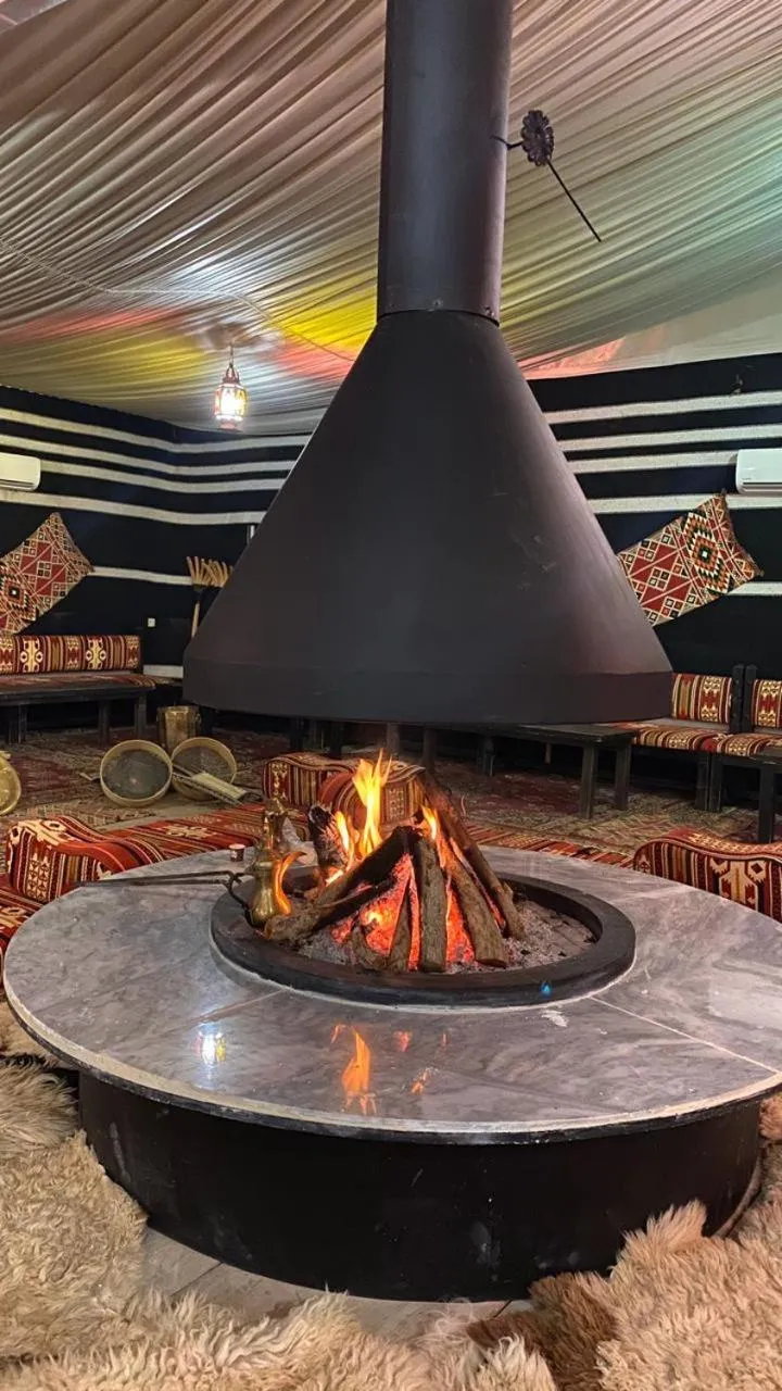 Communal lounge/ TV room in Mazayen Rum Camp