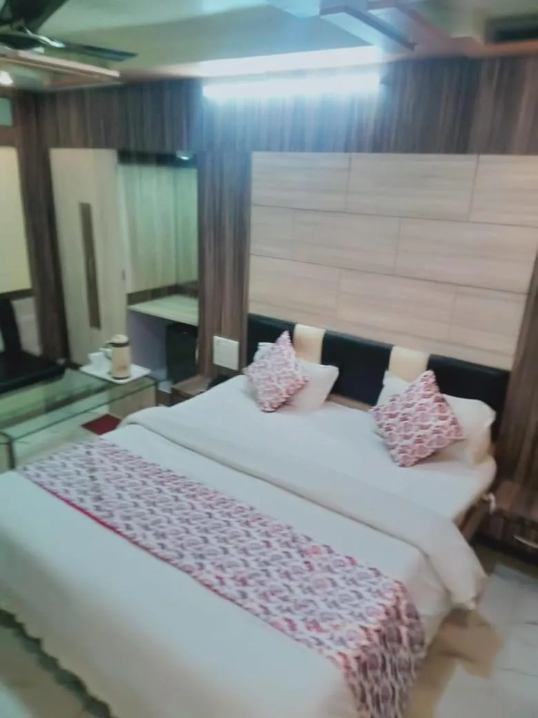 Bed in Hotel Metro Inn