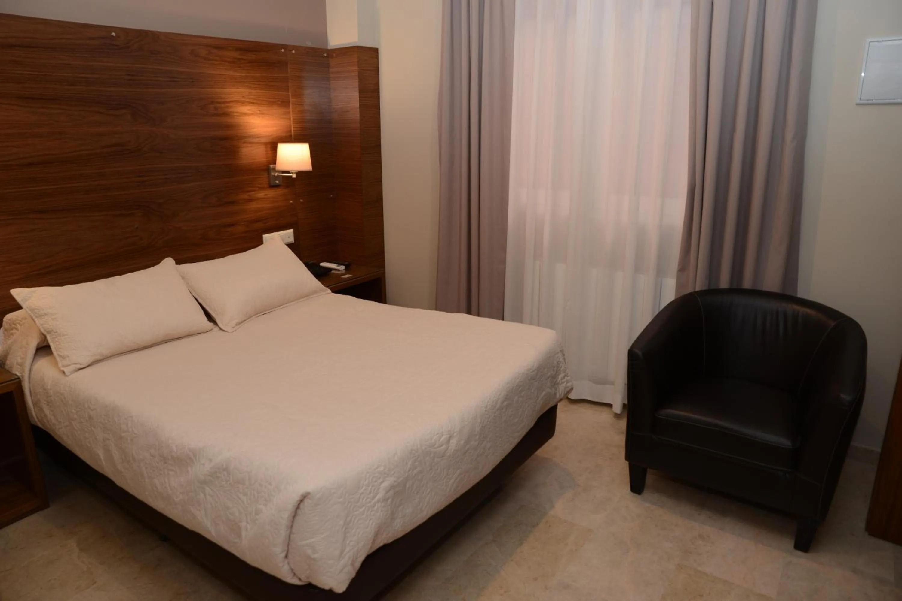 Bed in Hotel Escudero