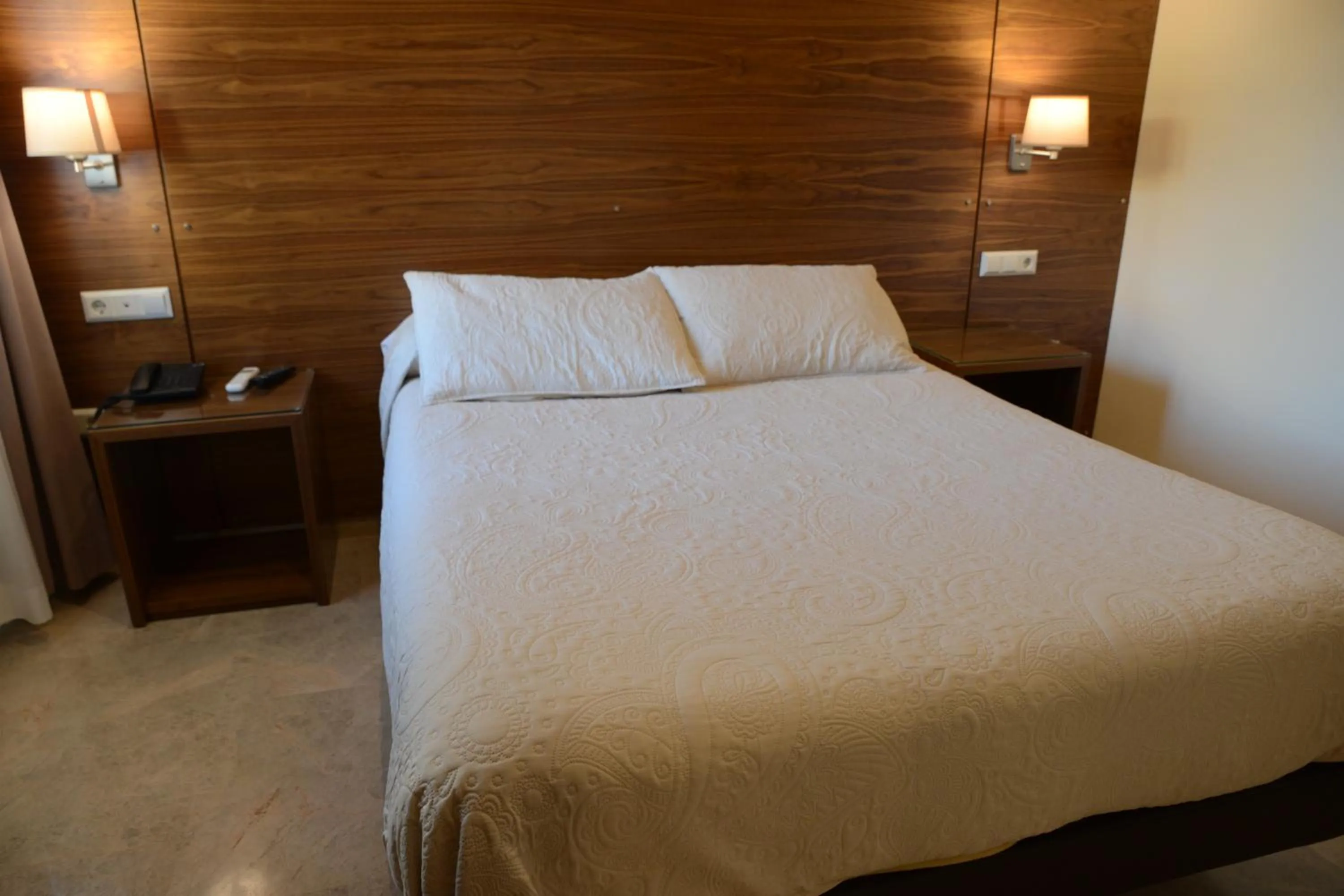 Bed in Hotel Escudero