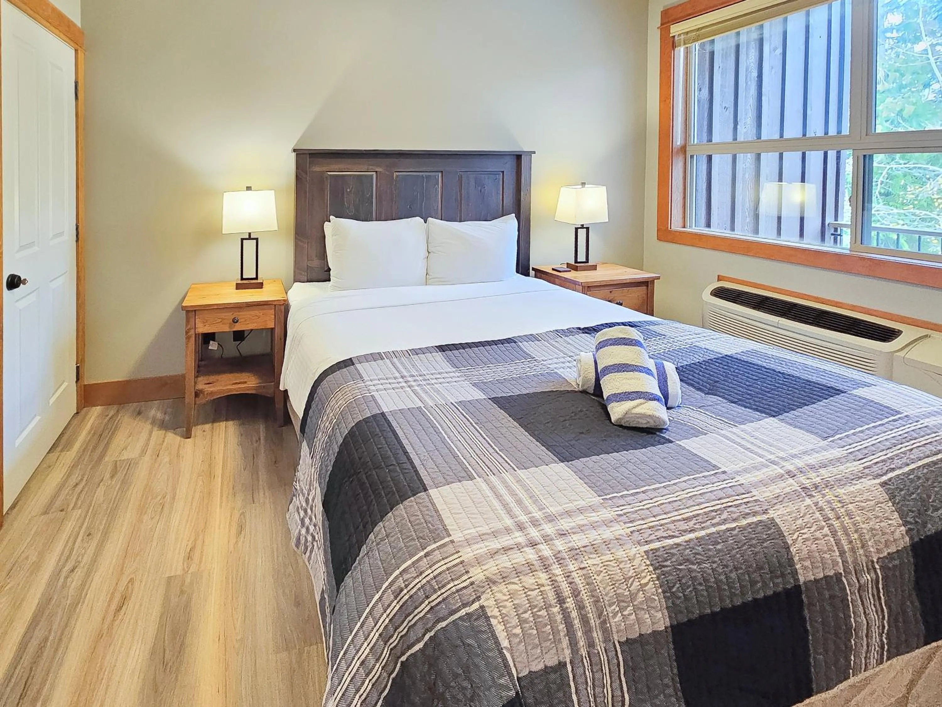 Bed in Timberline Lodges by Fernie Lodging Co