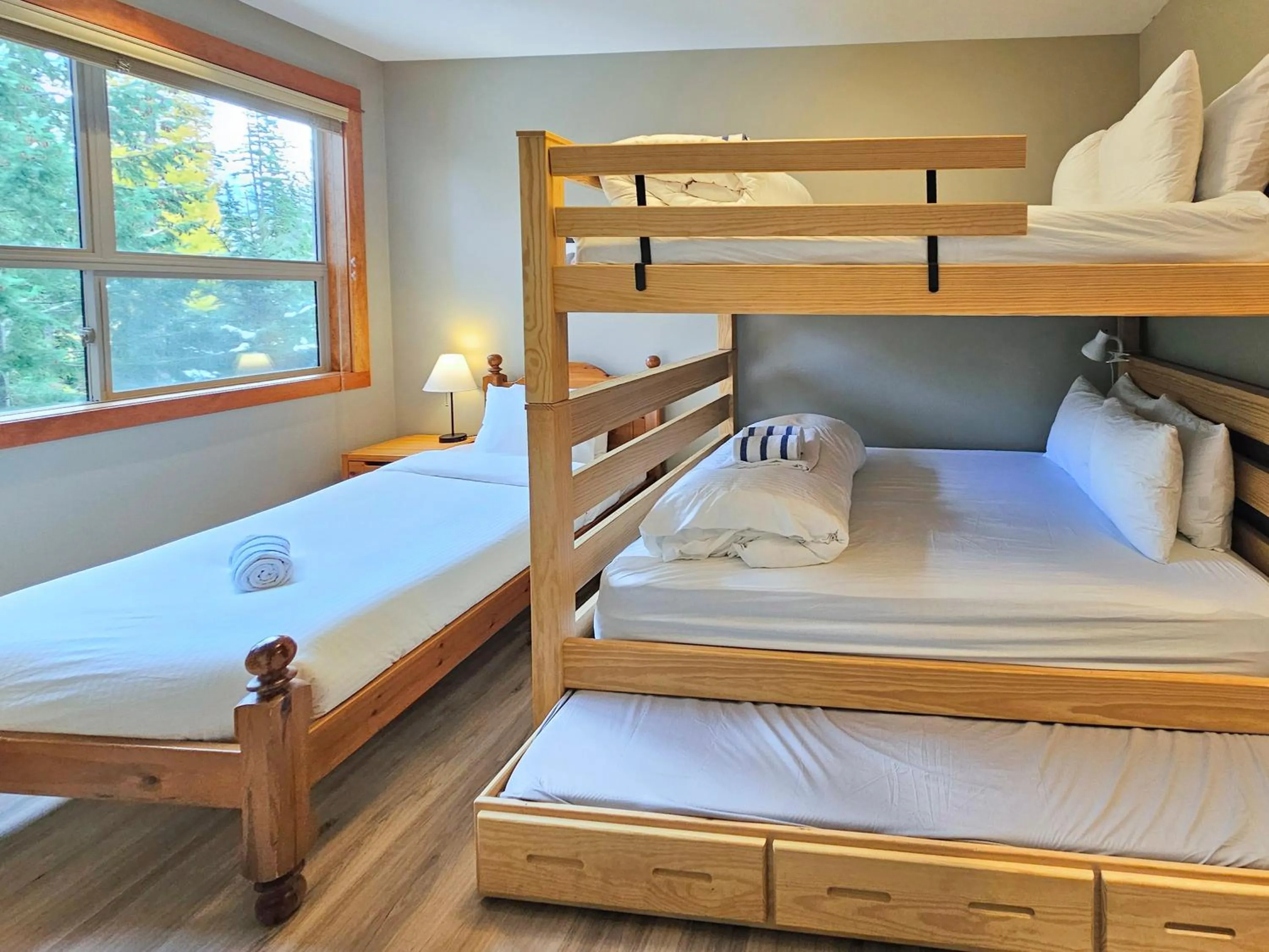 Bed in Timberline Lodges by Fernie Lodging Co