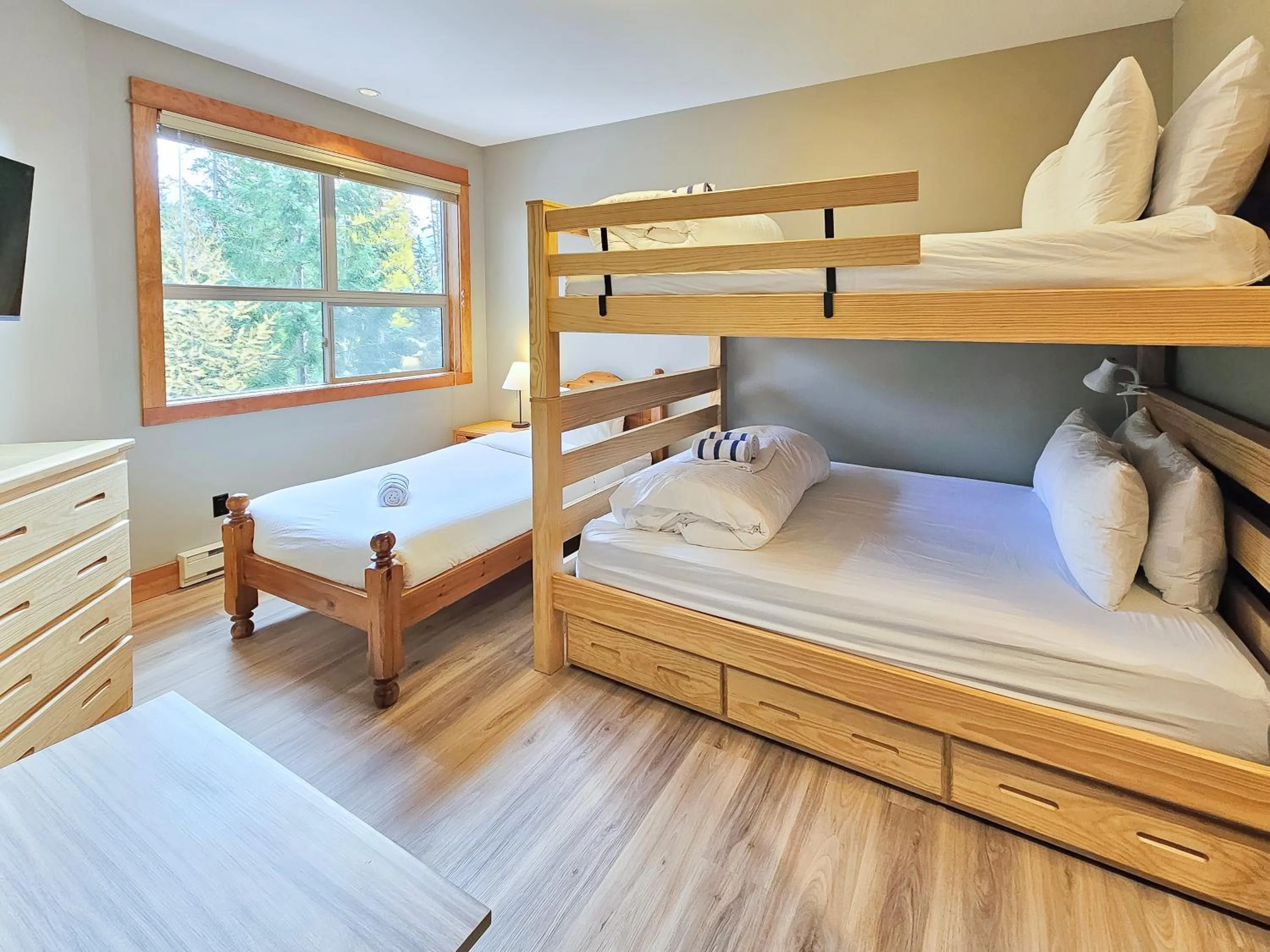 Bed in Timberline Lodges by Fernie Lodging Co
