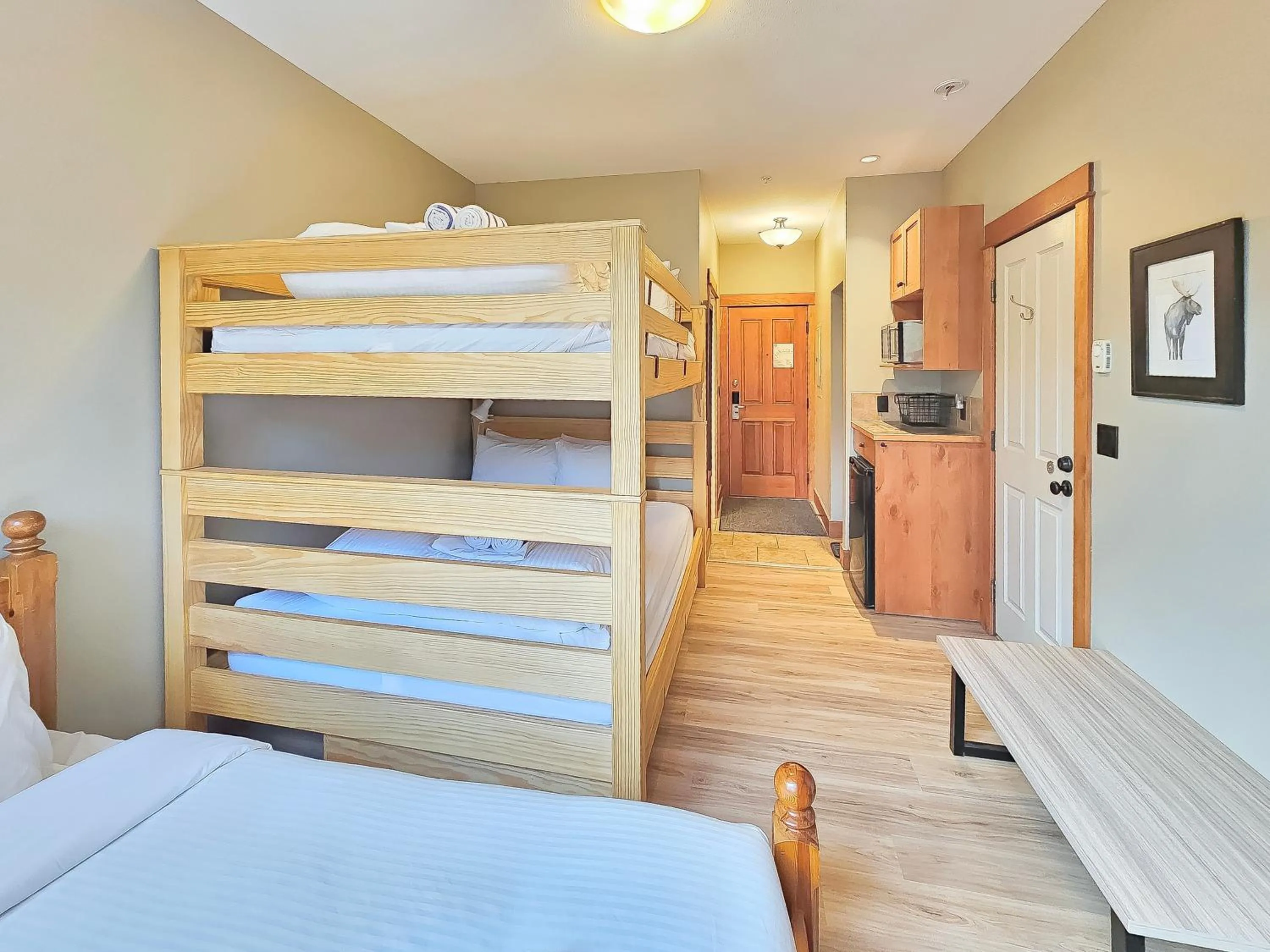 Bed in Timberline Lodges by Fernie Lodging Co