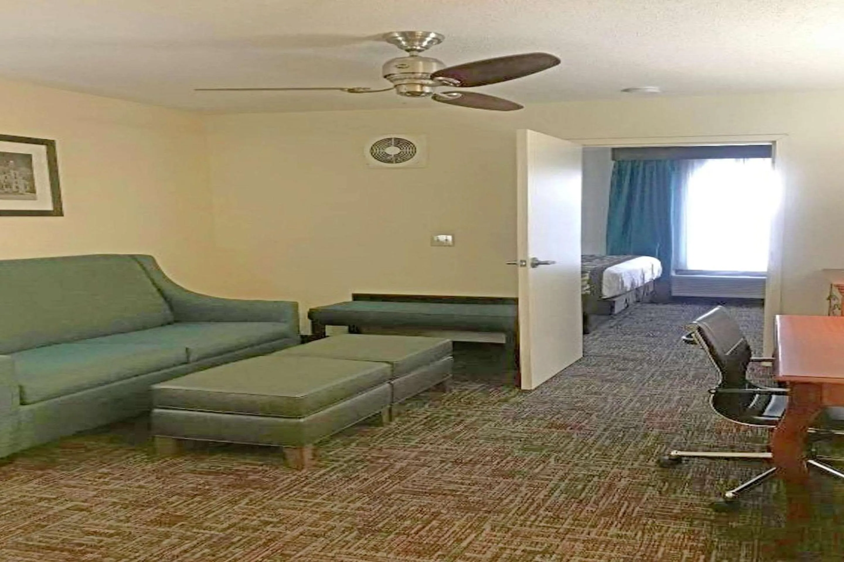 Bedroom in Rodeway Inn & Suites