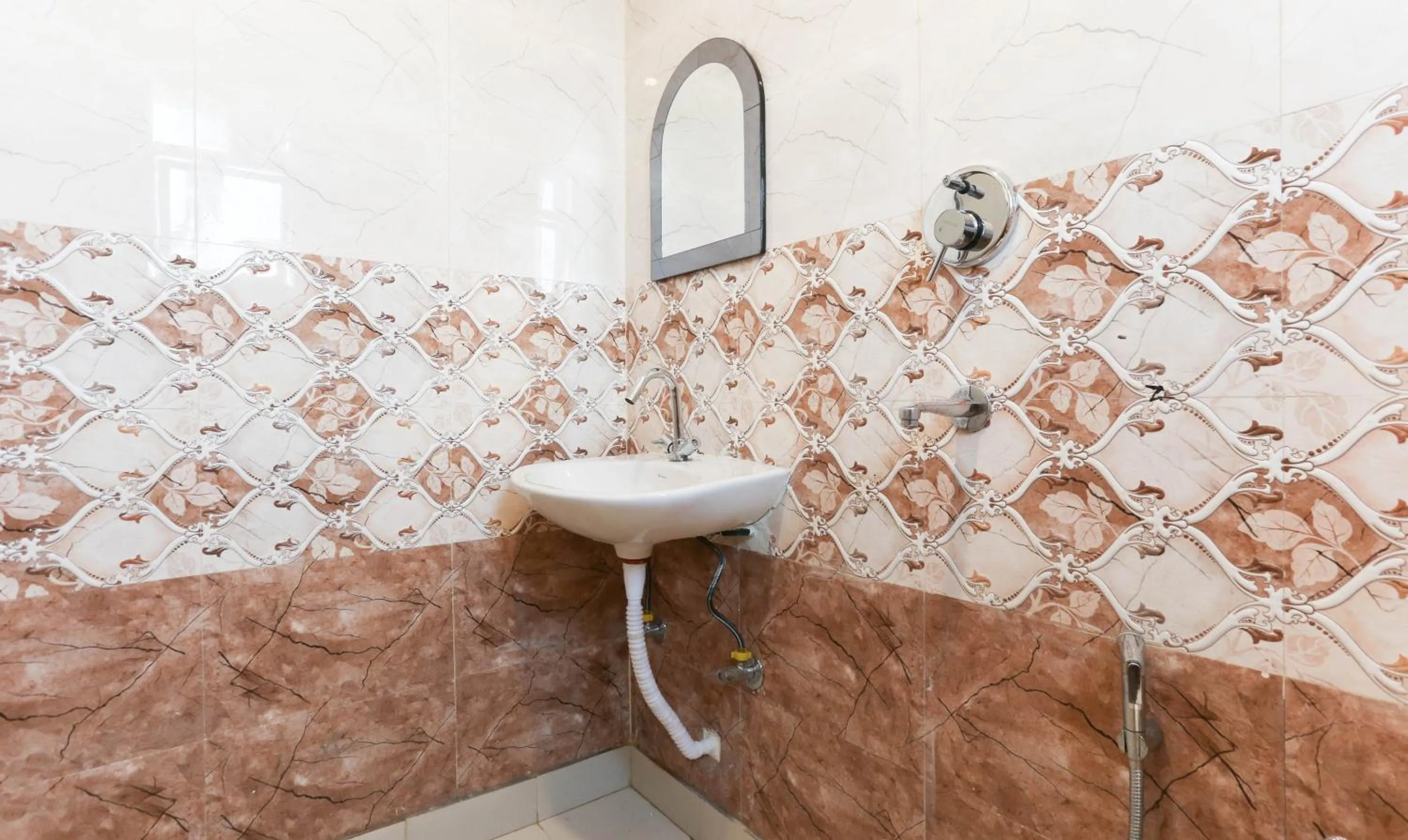 Bathroom in Hotel TMS Residency