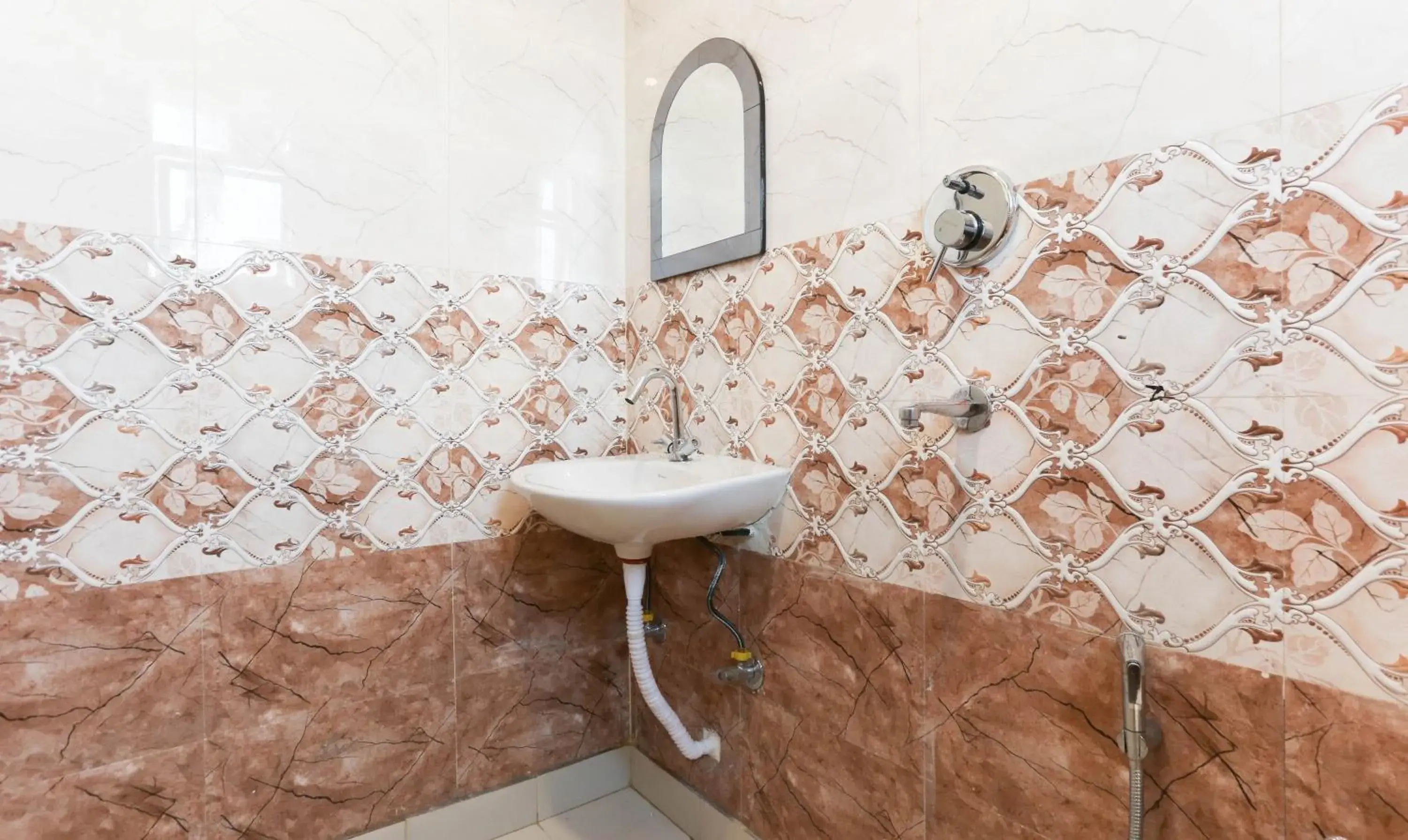 Bathroom in Hotel TMS Residency Bathroom in Hotel TMS Residency