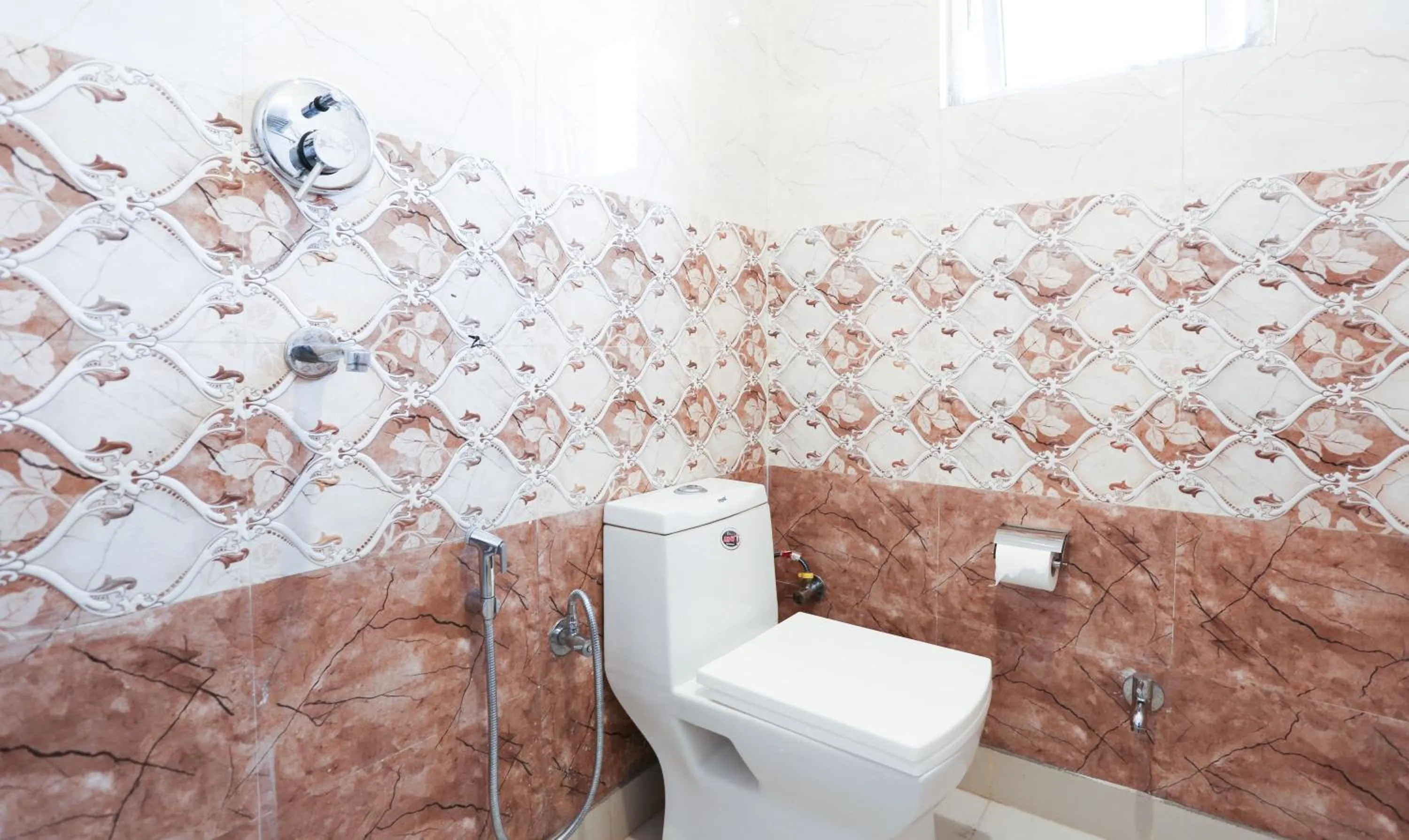 Bathroom in Hotel TMS Residency