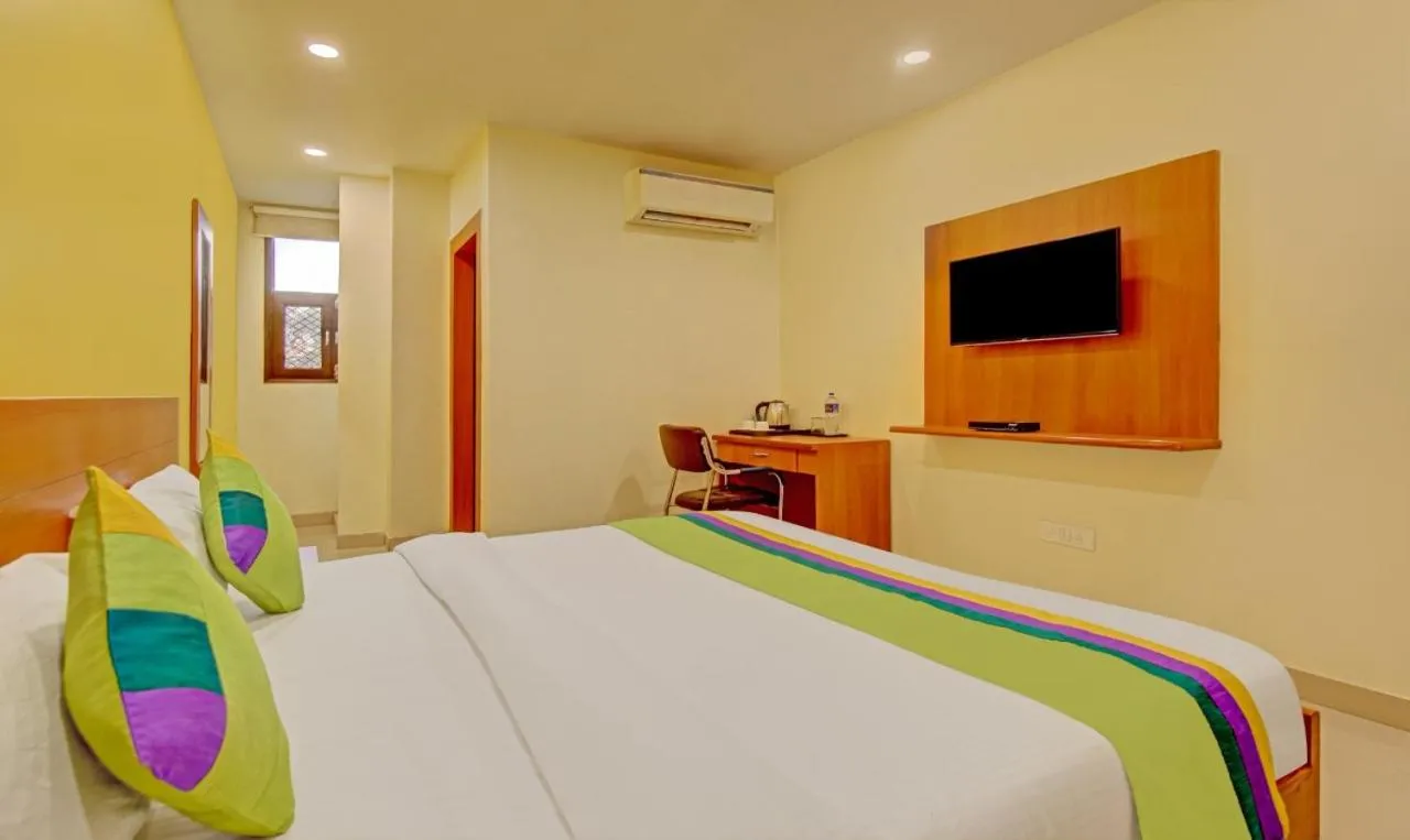 Bed in Hotel TMS Residency