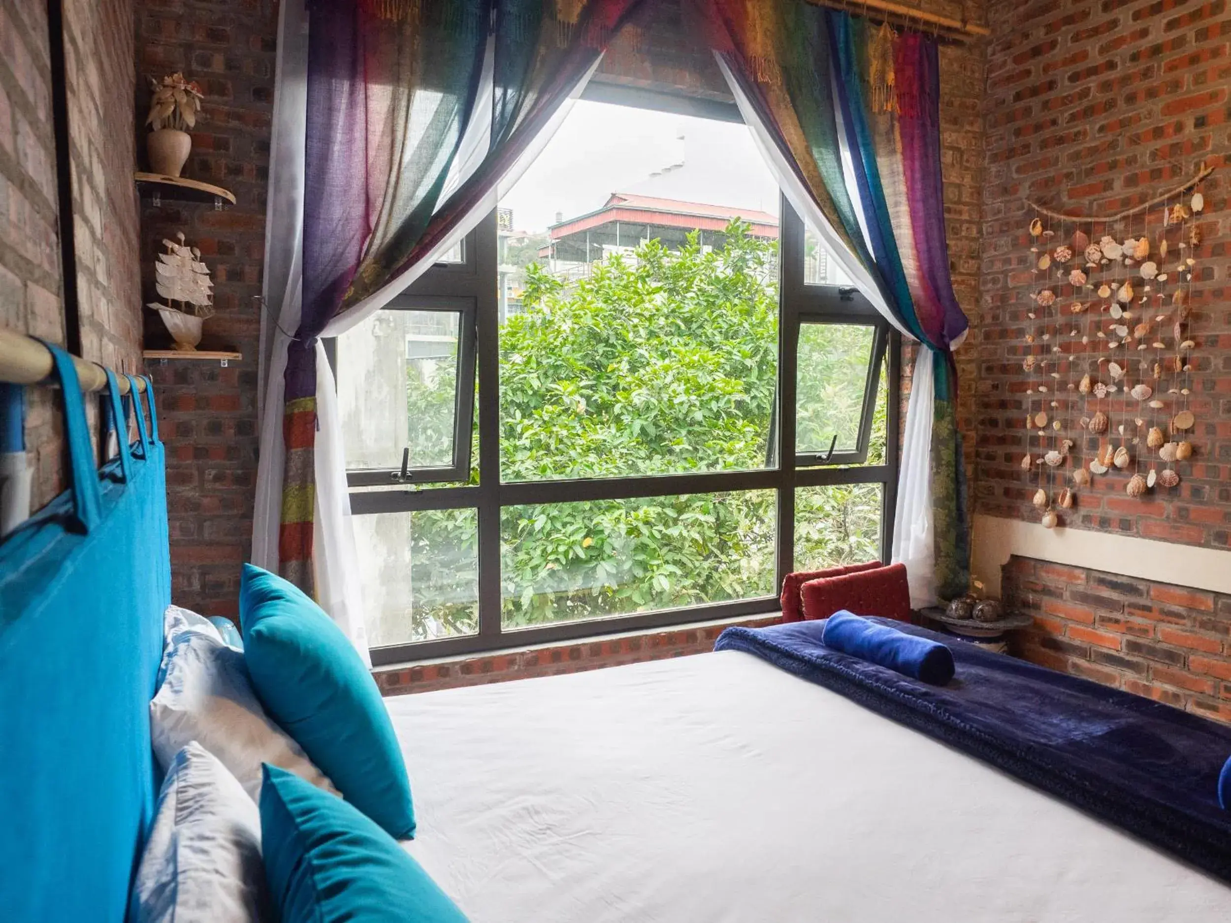 Quadruple Room with Garden View in Halo Bay Homestay Quadruple Room with Garden View in Halo Bay Homestay