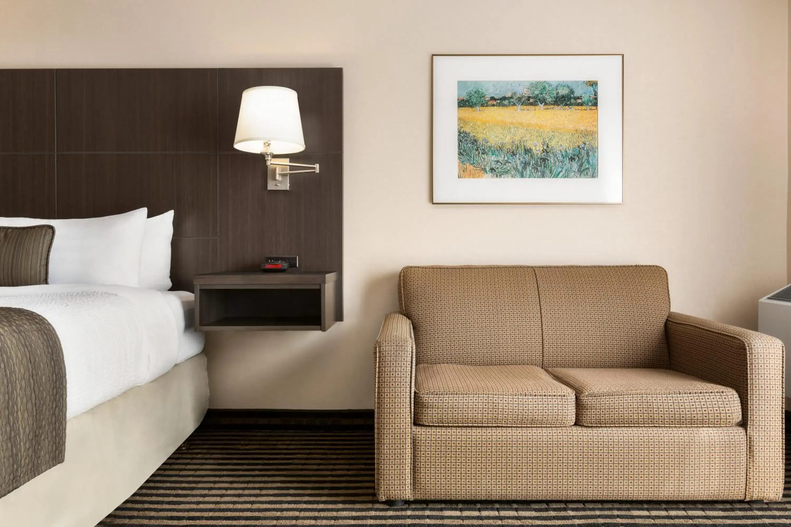 Seating area, Bed in Days Inn by Wyndham Miramichi NB Seating area, Bed in Days Inn by Wyndham Miramichi NB