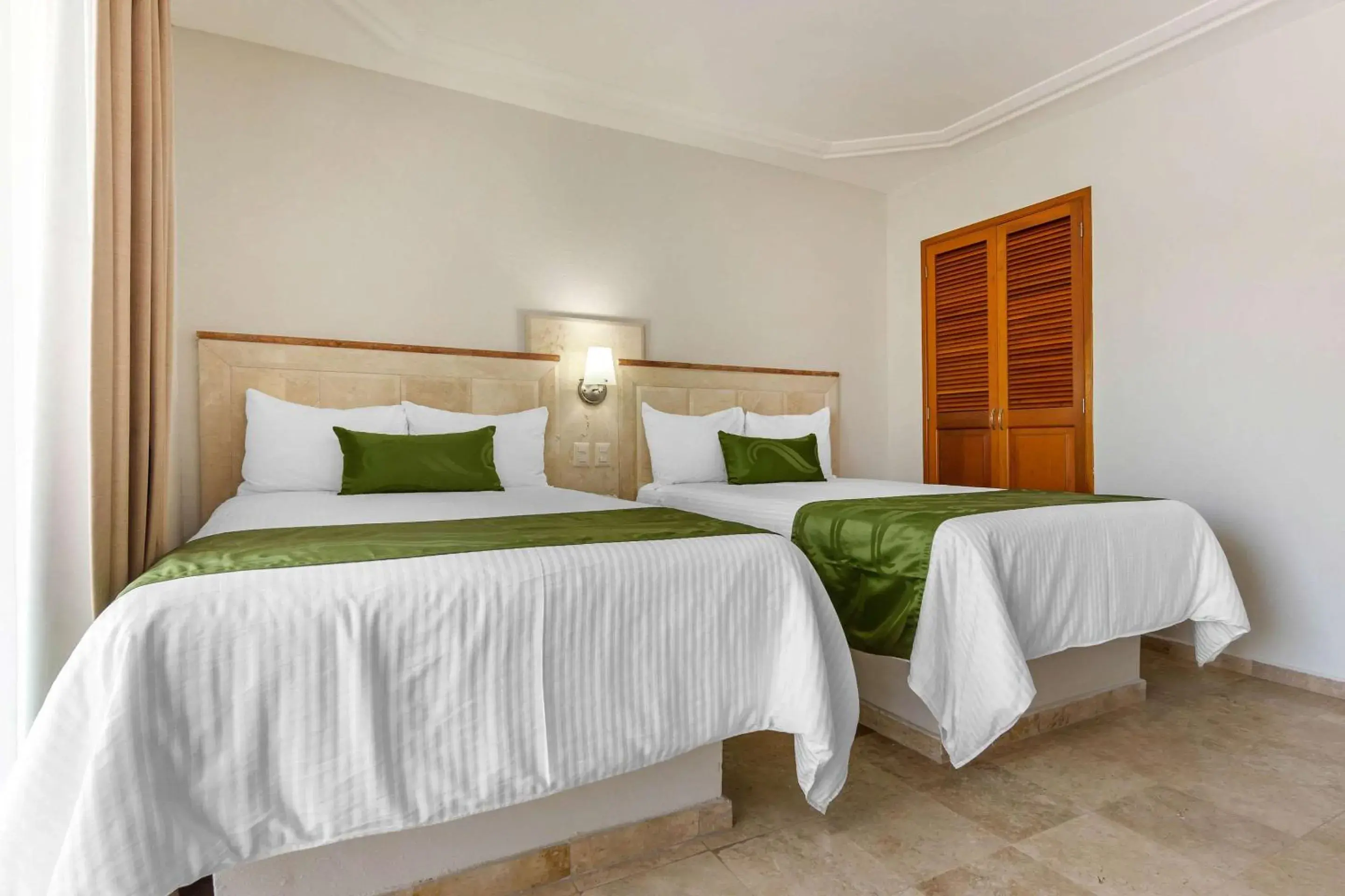 Photo of the whole room, Bed in Quality Inn Mazatlan Photo of the whole room, Bed in Quality Inn Mazatlan