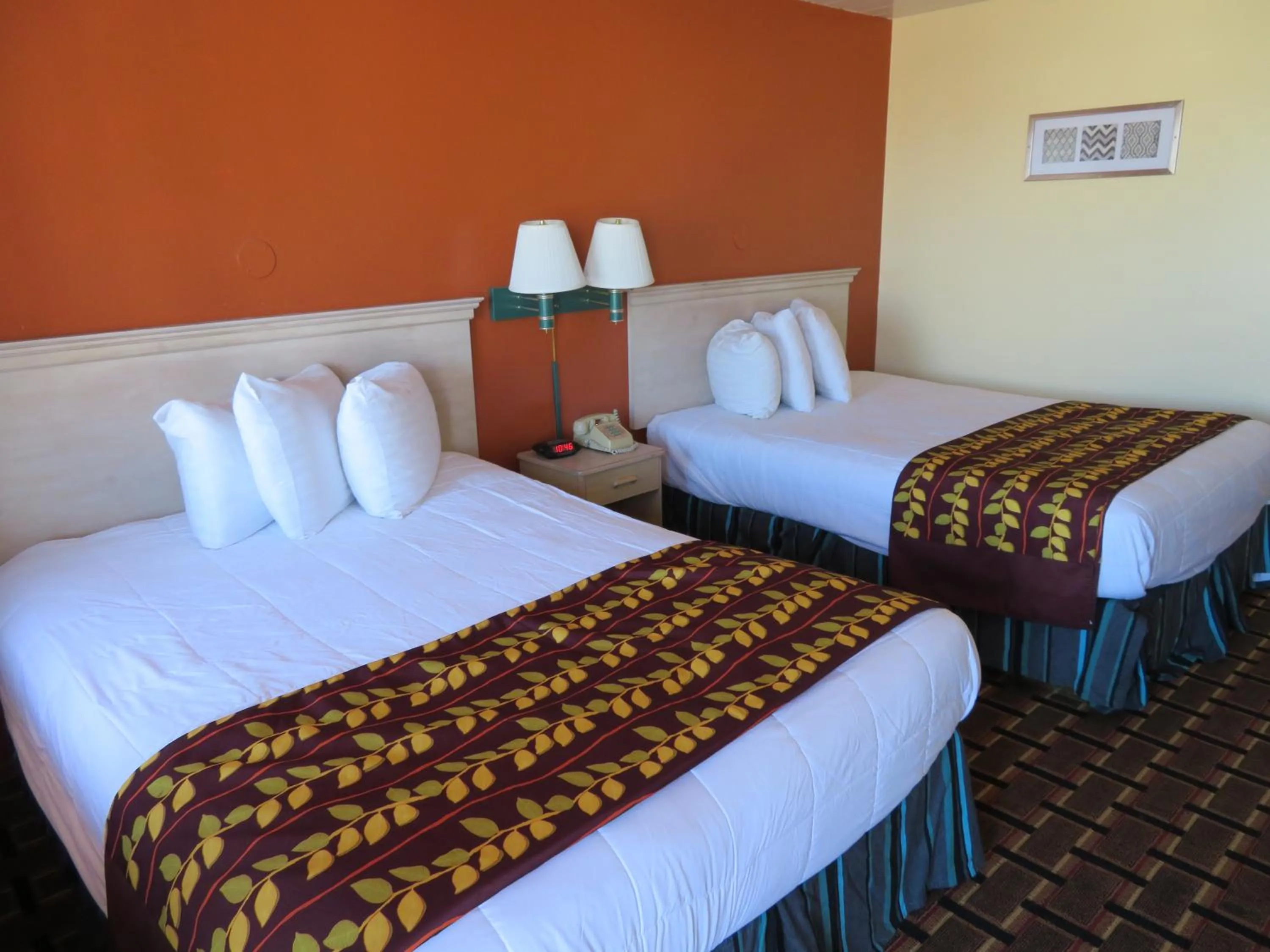 Bed in Royal Crest Motel