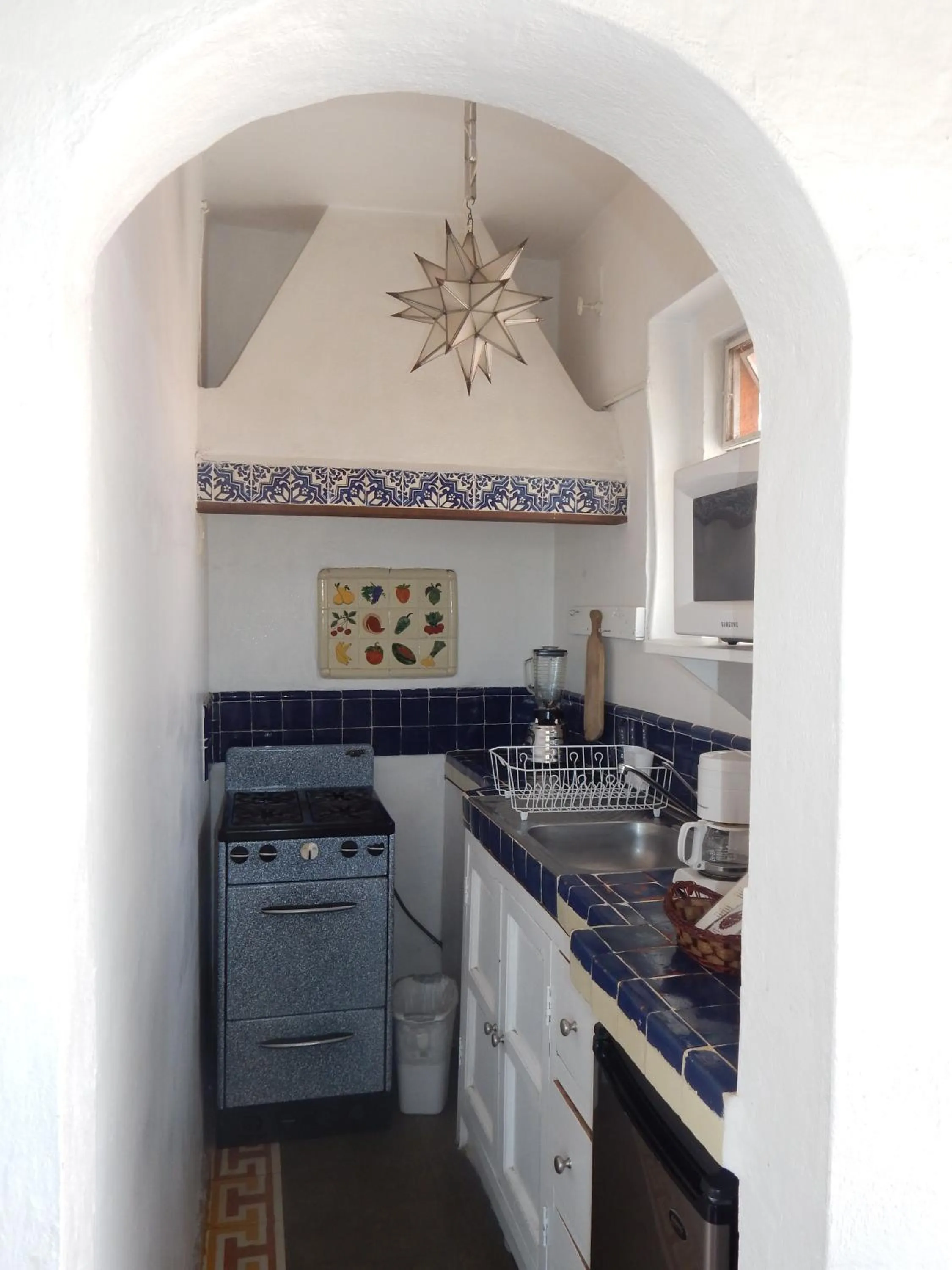 Kitchen or kitchenette in Suites Santo Domingo