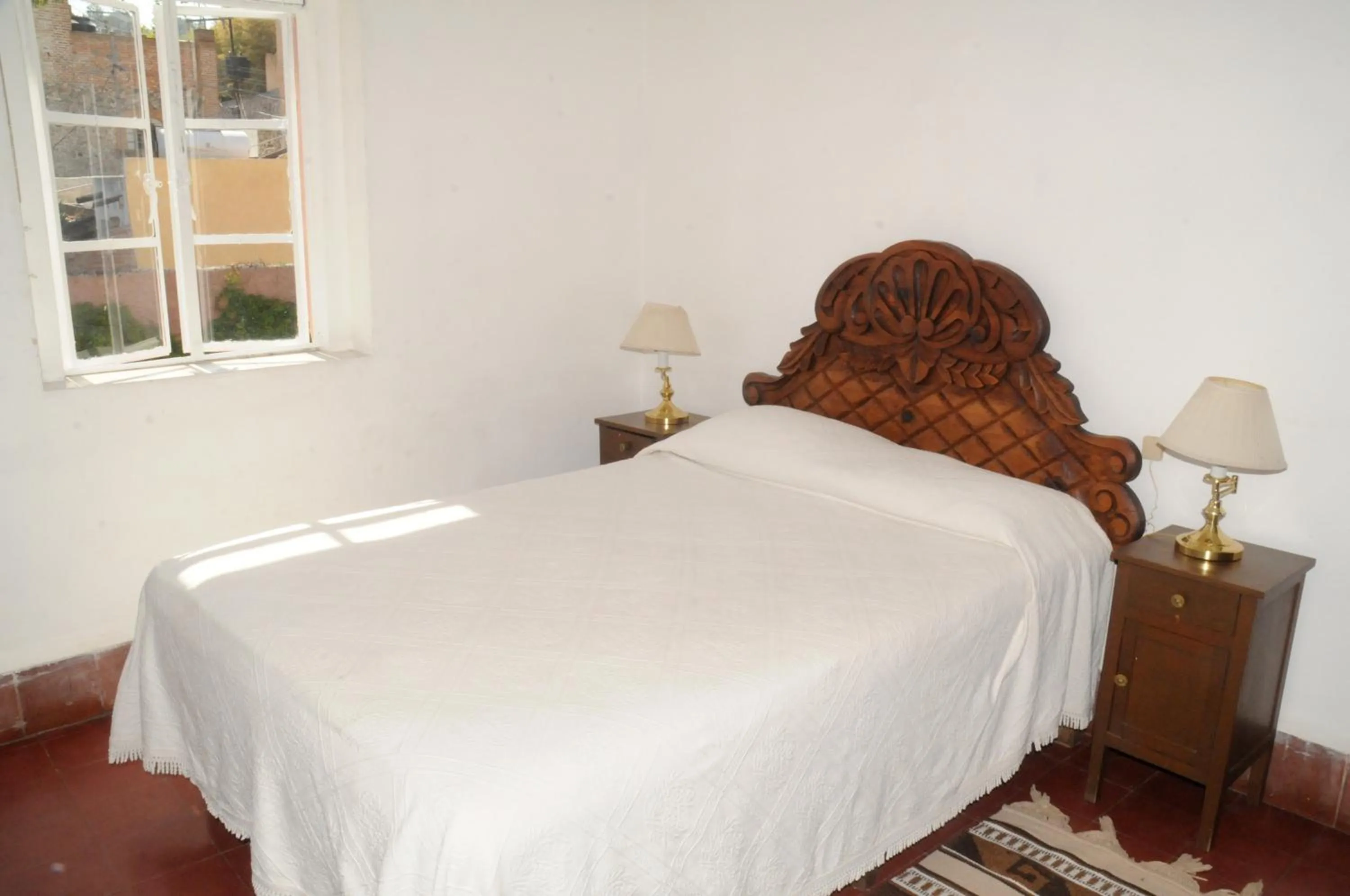 Bed in Suites Santo Domingo