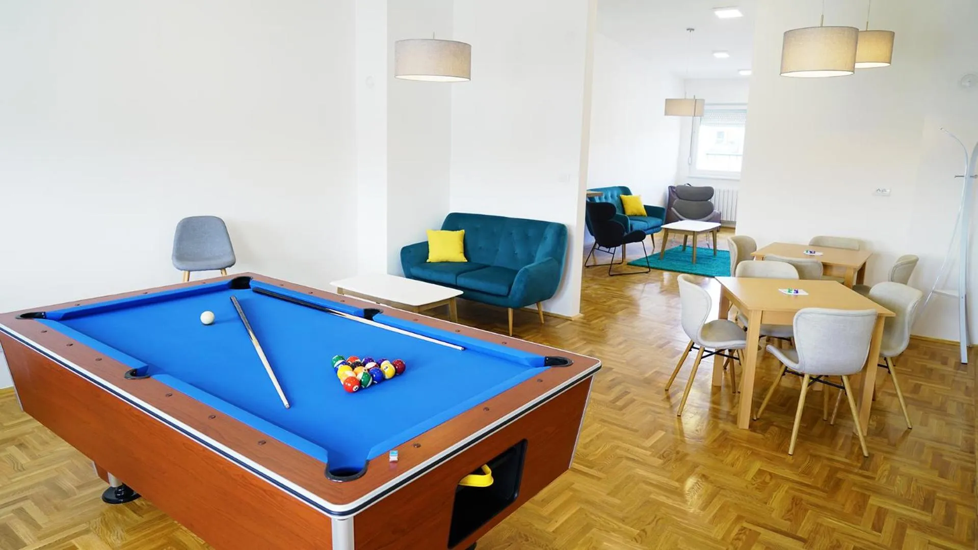 Communal lounge/ TV room in Novel Inn