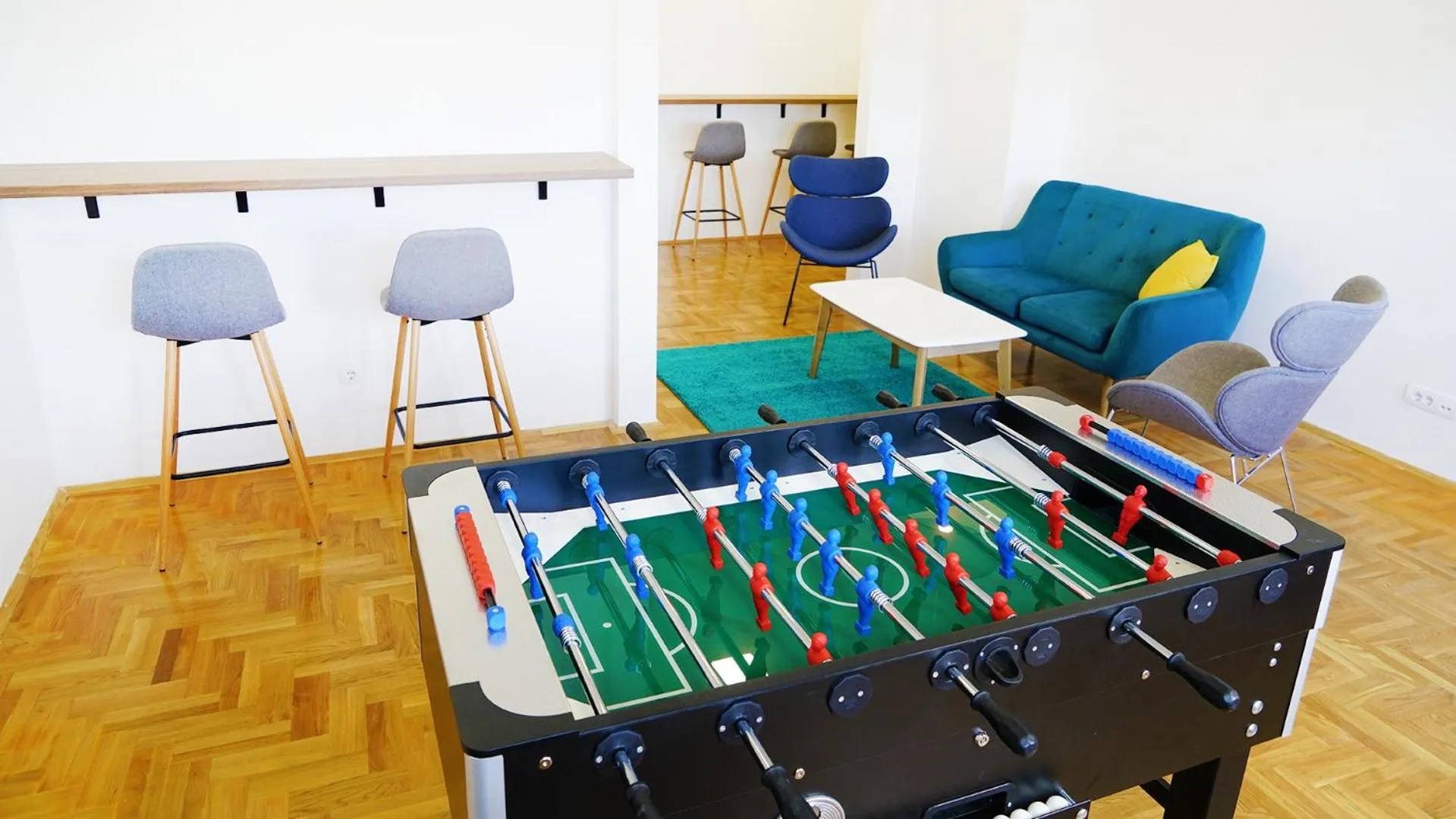 Communal lounge/ TV room in Novel Inn