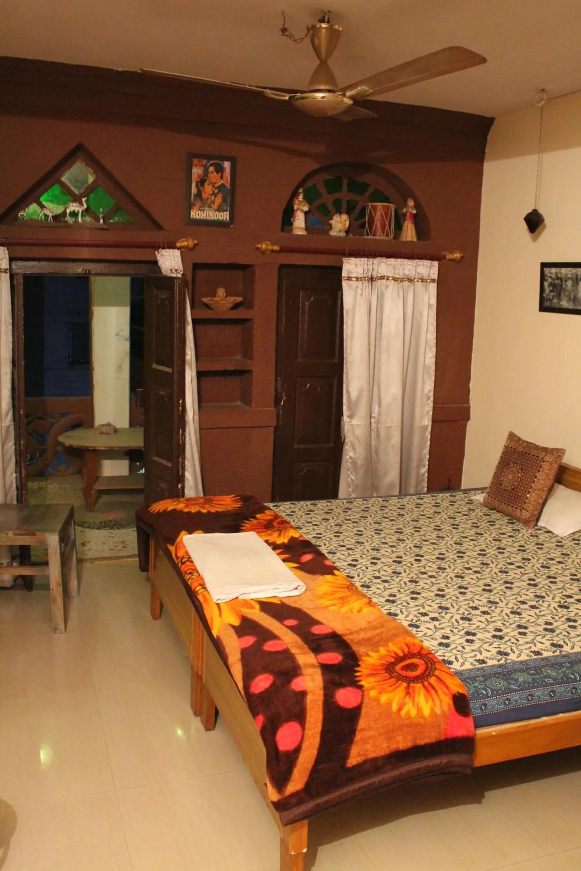 Bed in Kesar Heritage Boutique Home Stay