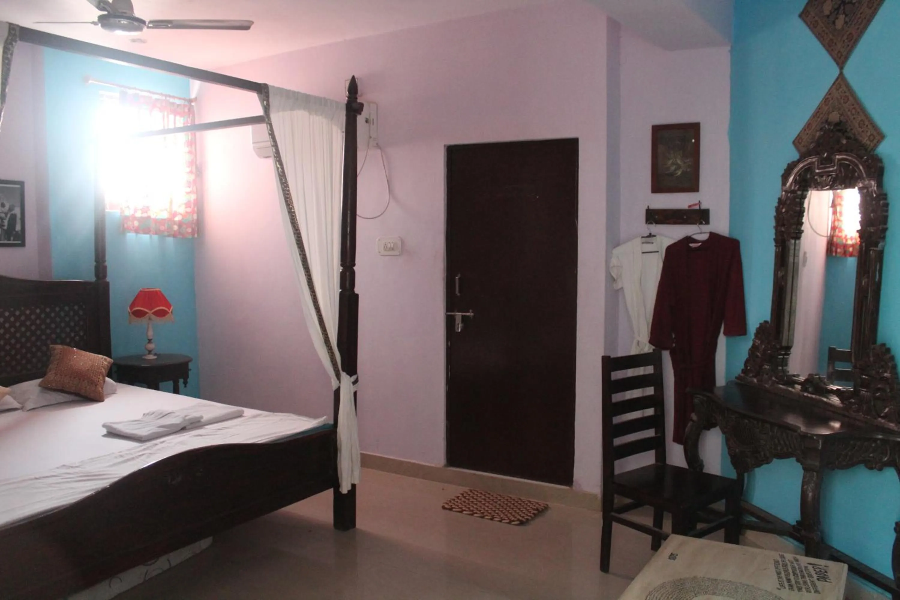 Bed in Kesar Heritage Boutique Home Stay