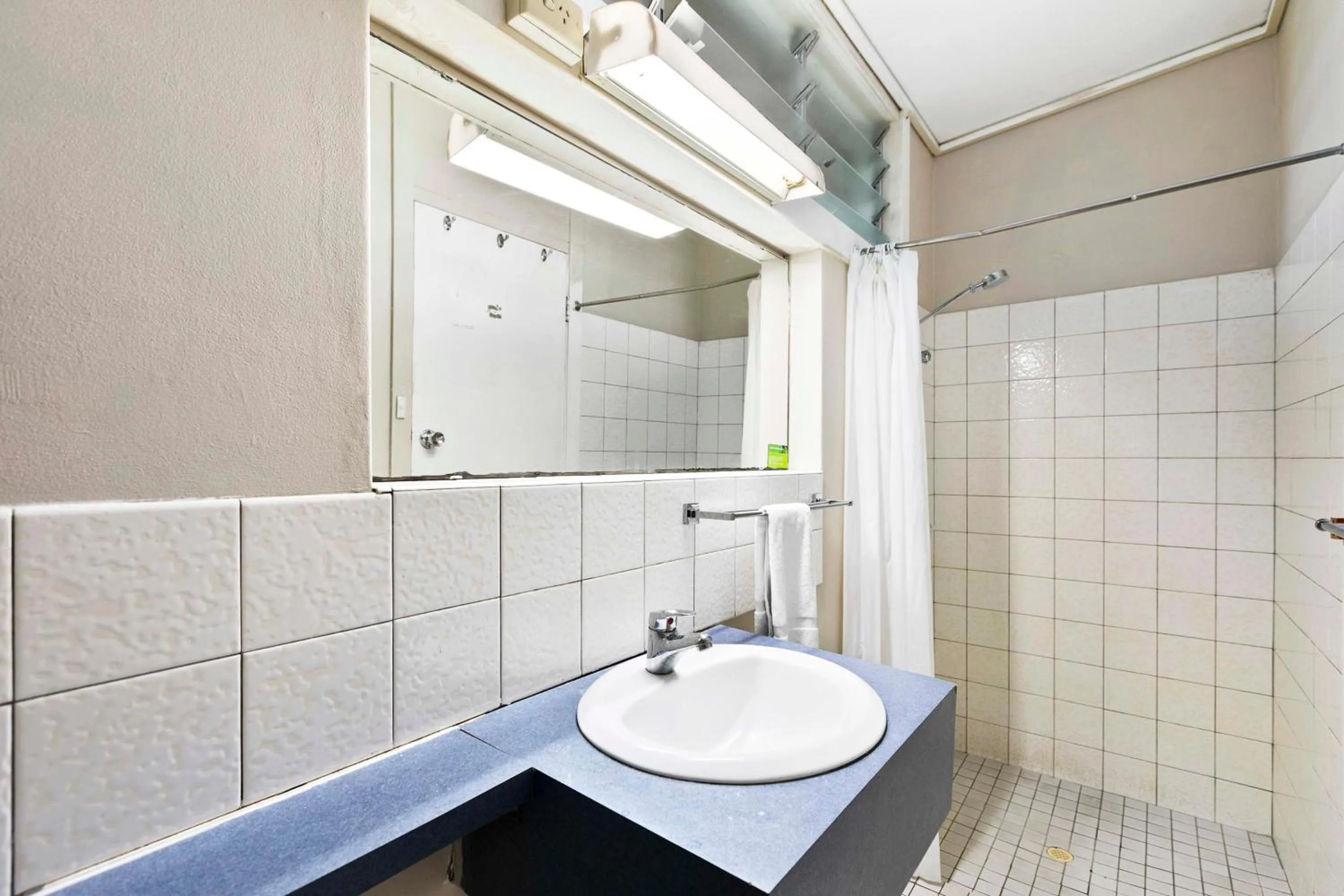 Bathroom in Arkana Motel Maryborough, SureStay Collection by Best Western
