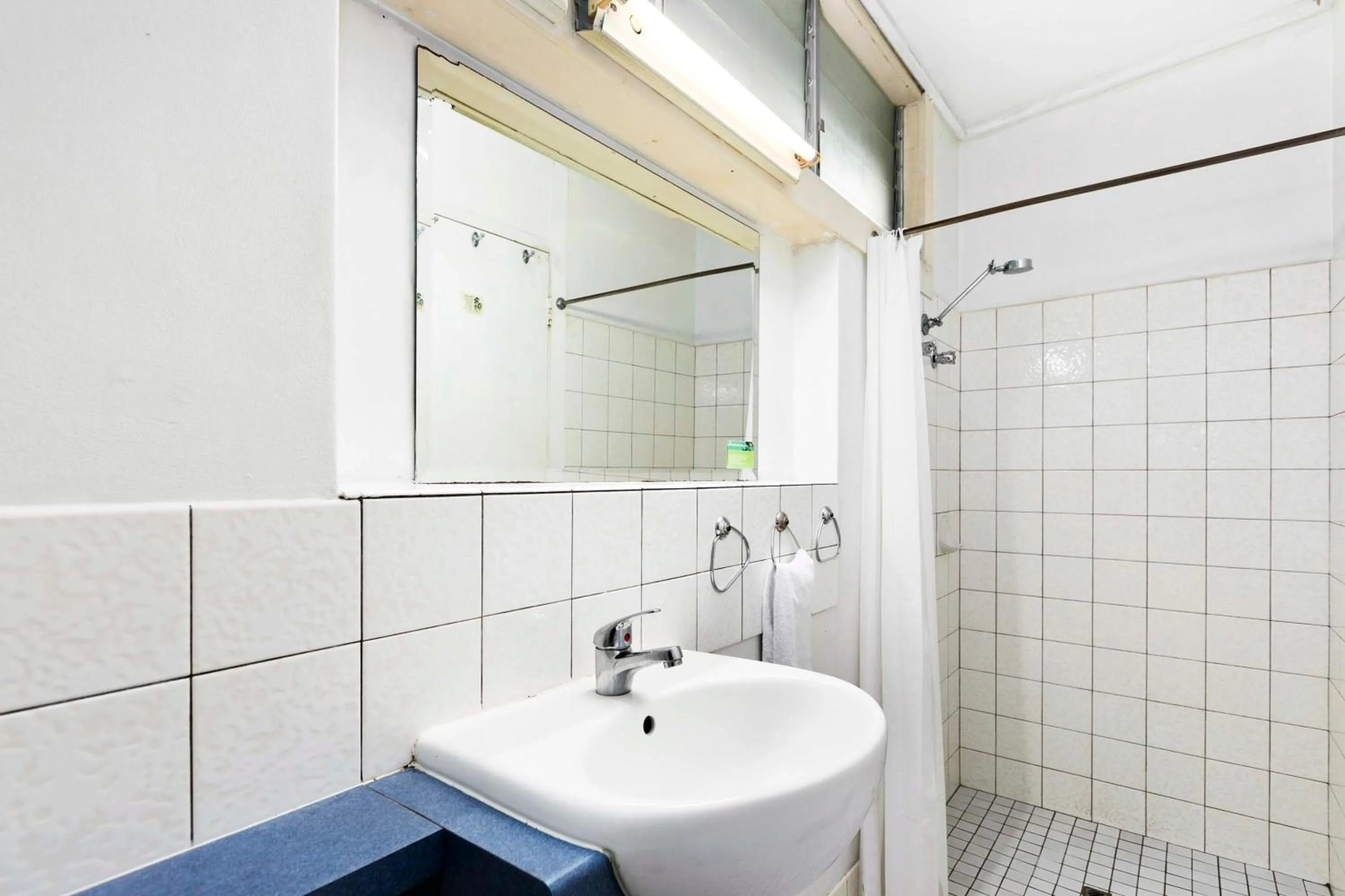 Bathroom in Arkana Motel Maryborough, SureStay Collection by Best Western