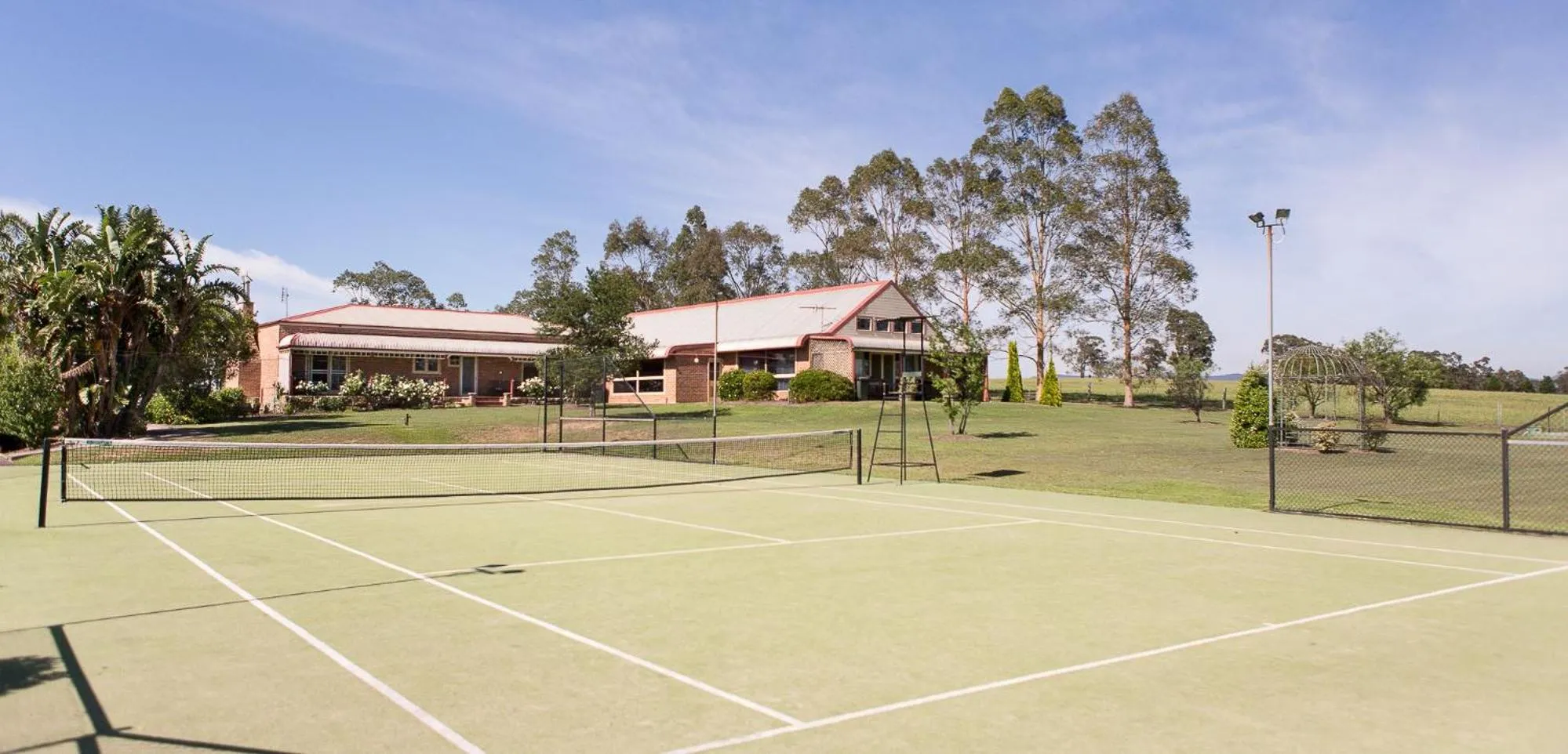 Tennis court in Bluebush Estate