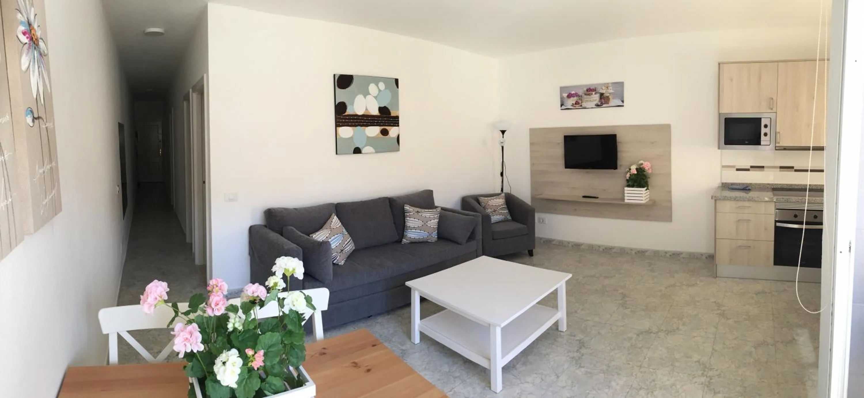 Living room in Billy's Las Rocas Apt Playa de Mogan with pool access