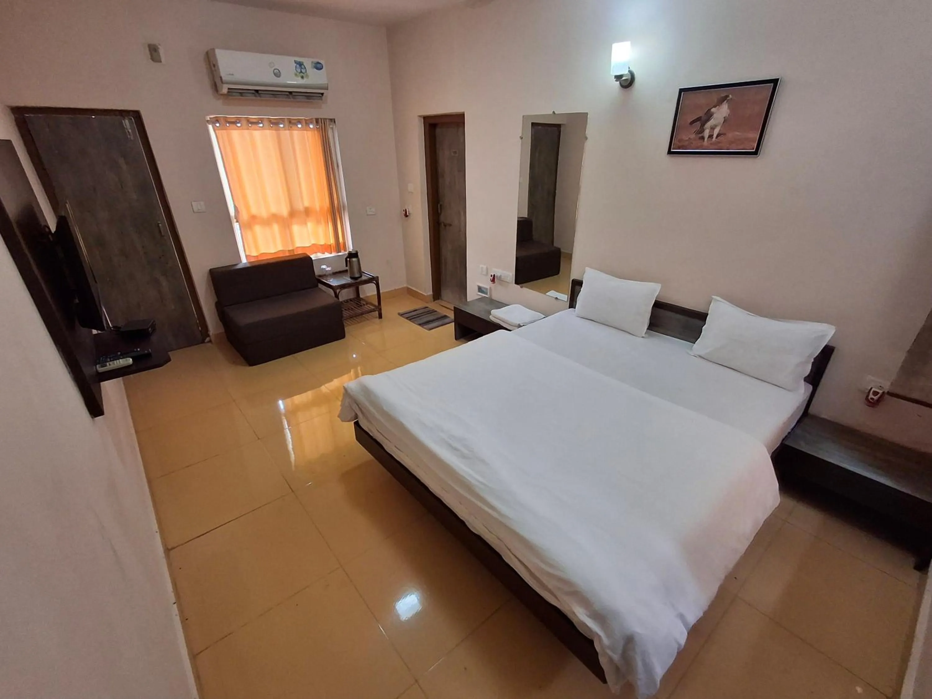 Bed in Gir Jungle Lodge