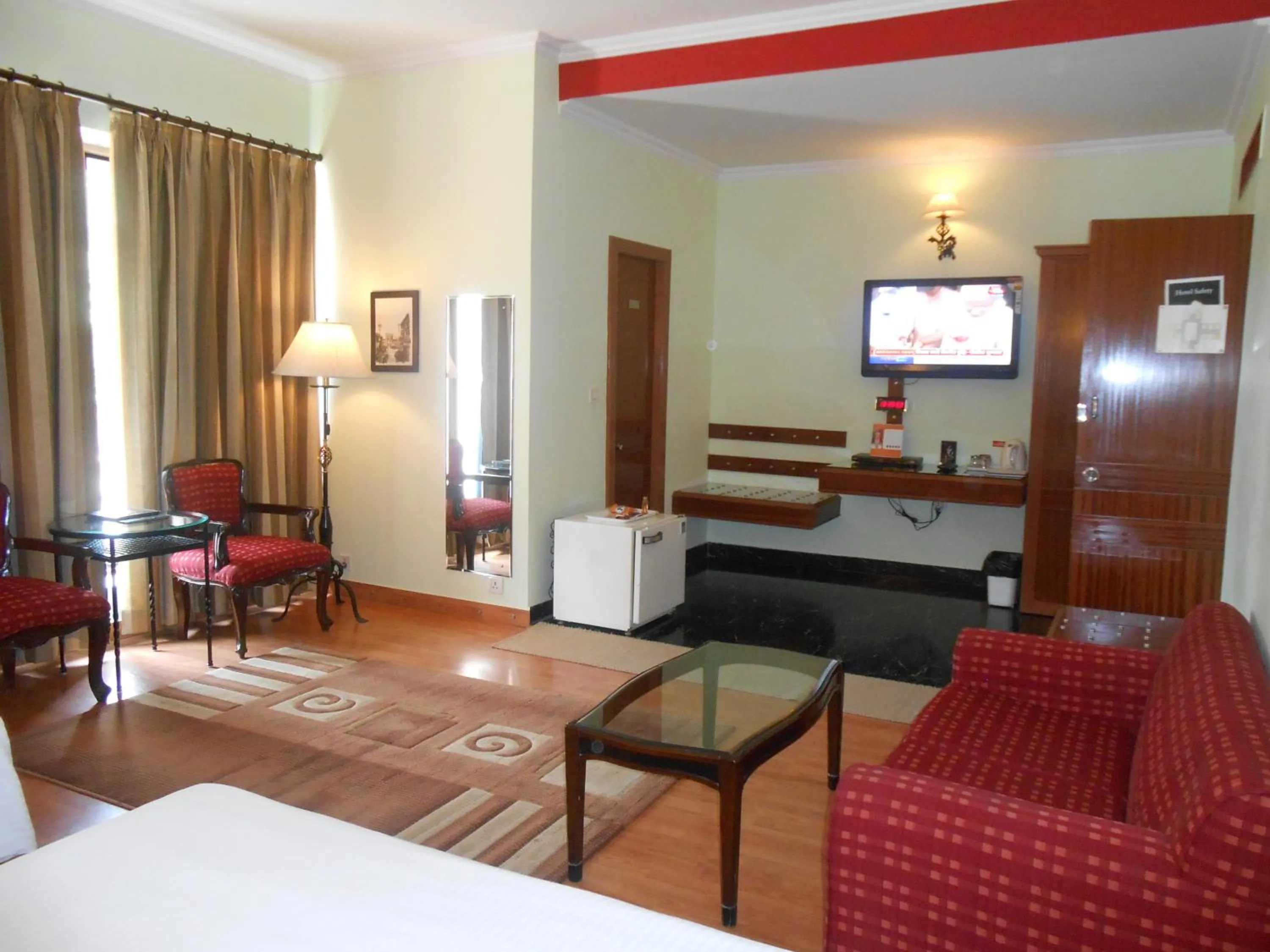 Photo of the whole room, Bed in The Radha Ashok