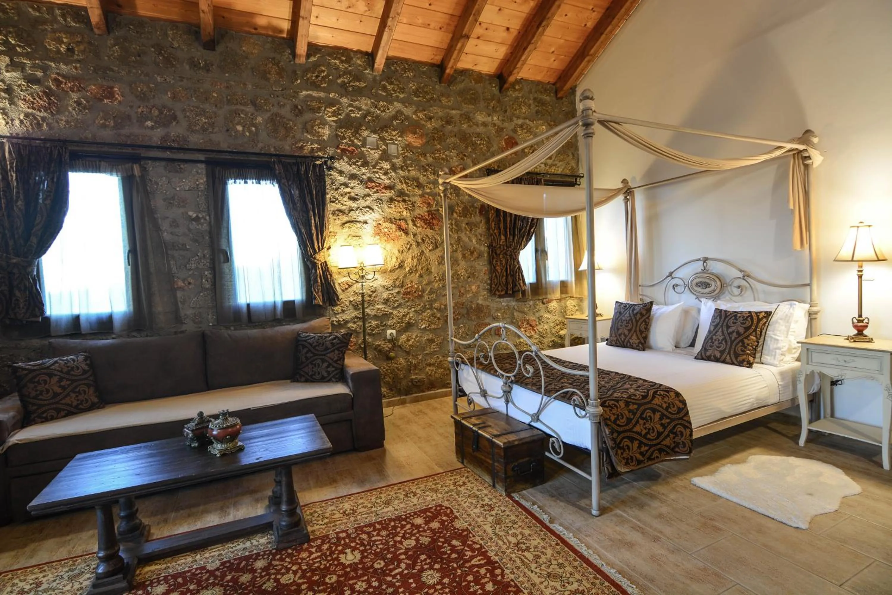 Bed in Trikalon Muses Art Suites