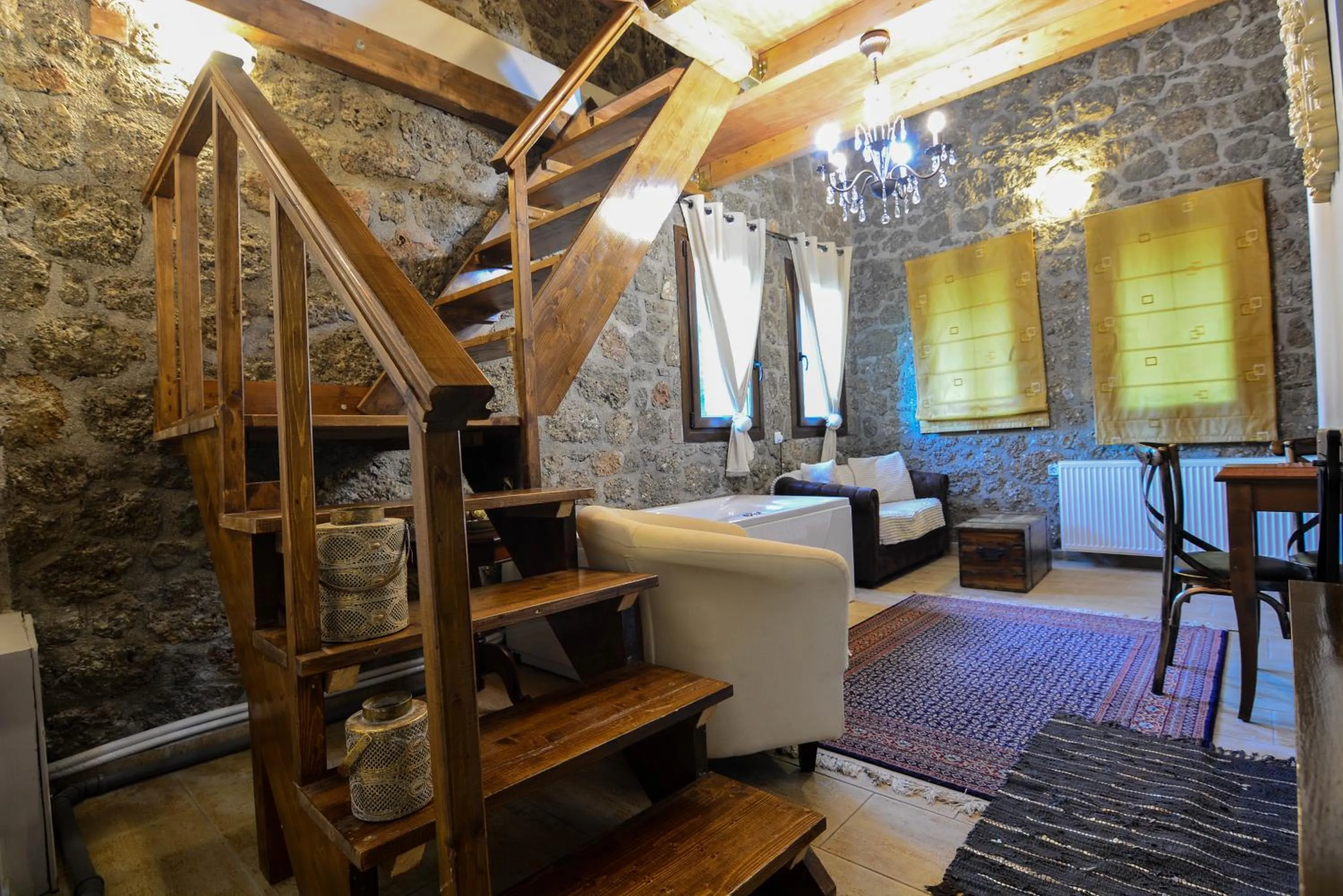 Living room, Bed in Trikalon Muses Art Suites