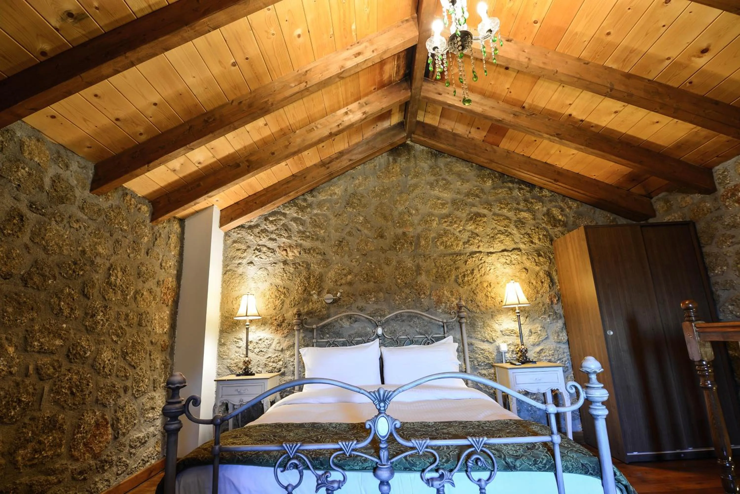 Bed in Trikalon Muses Art Suites