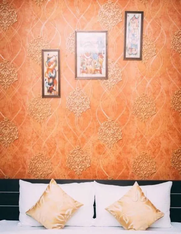 Bed in Hotel Suraj Palace