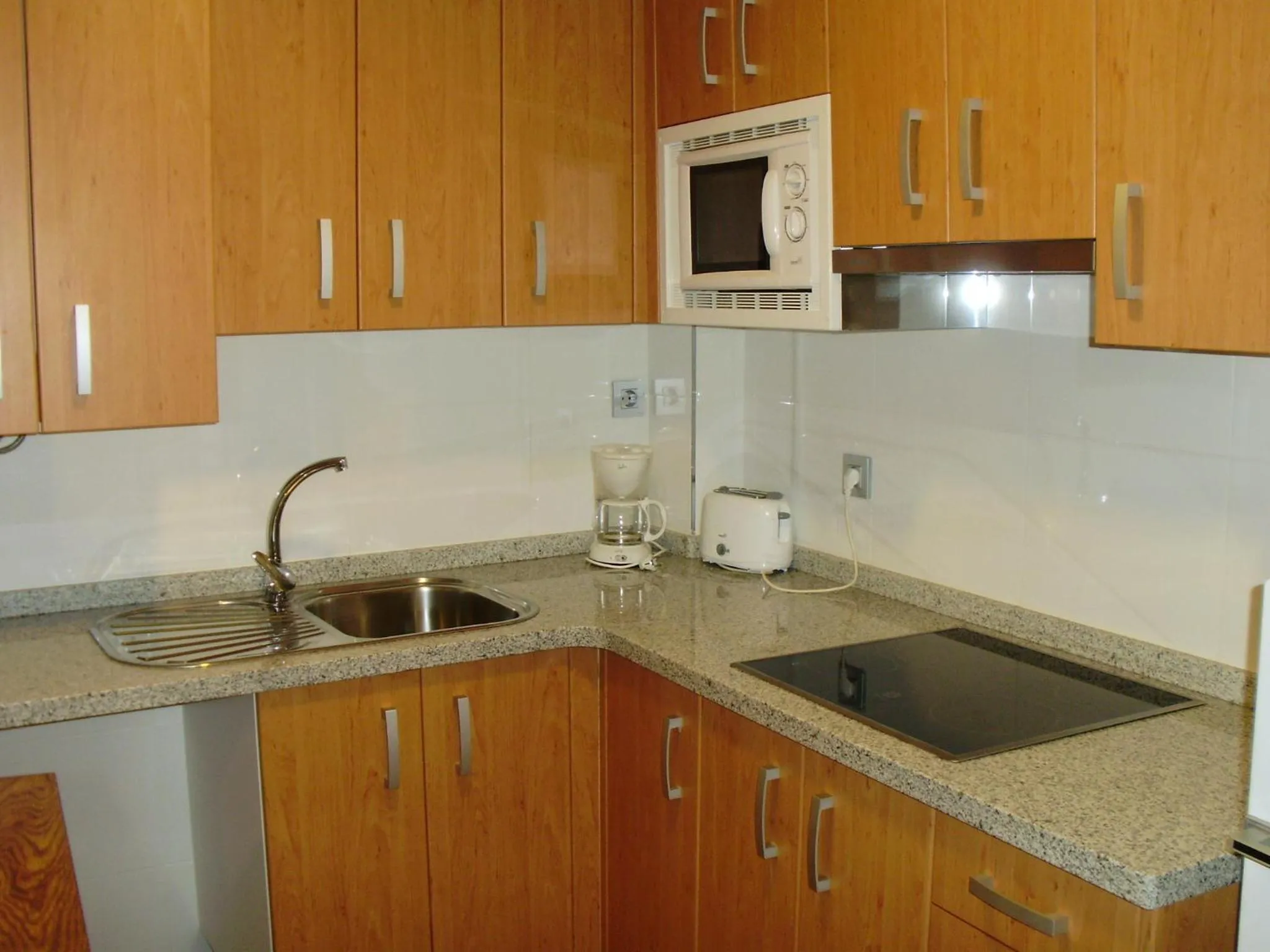 Kitchen or kitchenette in Apartamentos Boutique Catedral