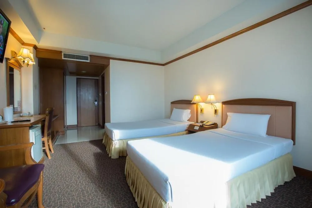 Bed in V.L. Hatyai Hotel