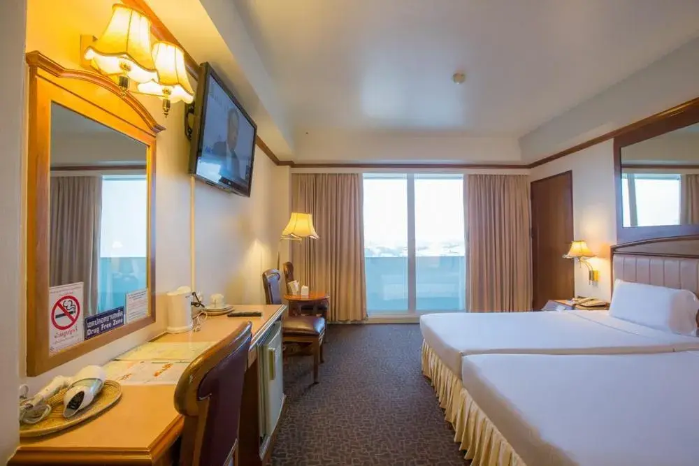 Bed in V.L. Hatyai Hotel Bed in V.L. Hatyai Hotel