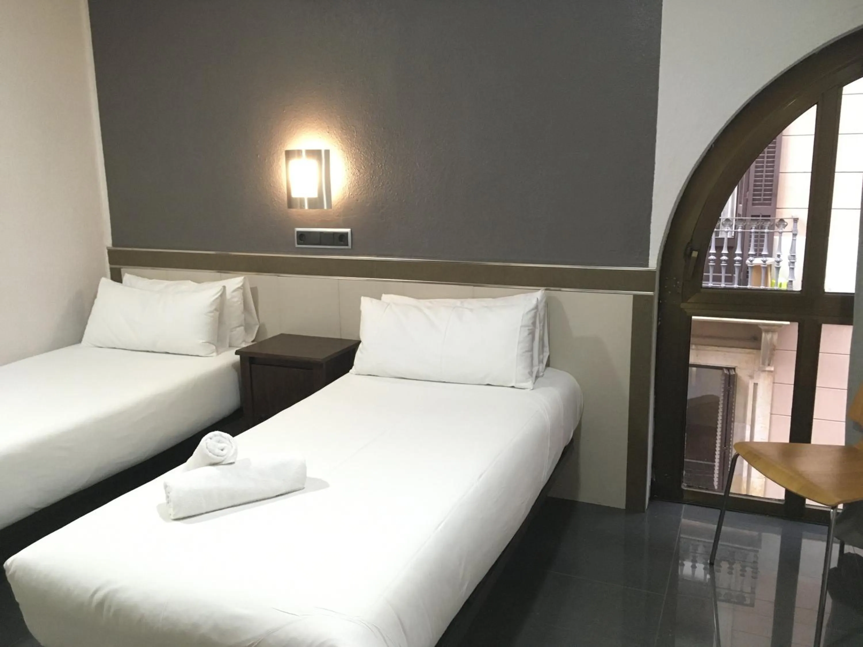 Bed in Hostal Levante Barcelona