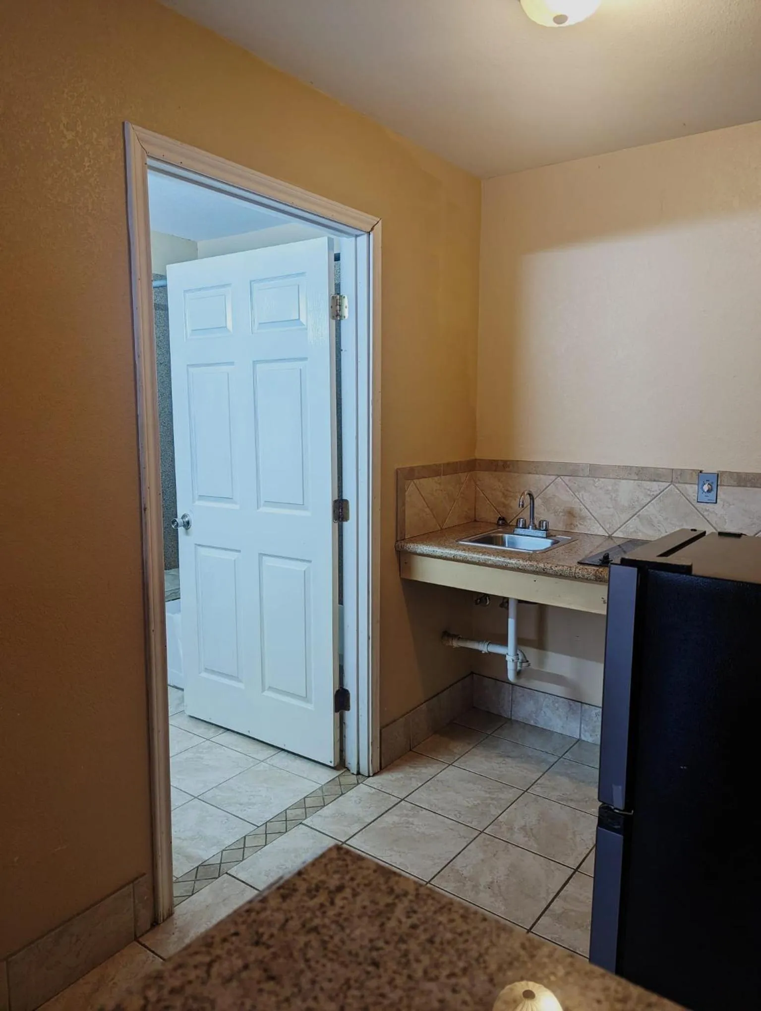 Kitchen or kitchenette in Residents Suites Liberty