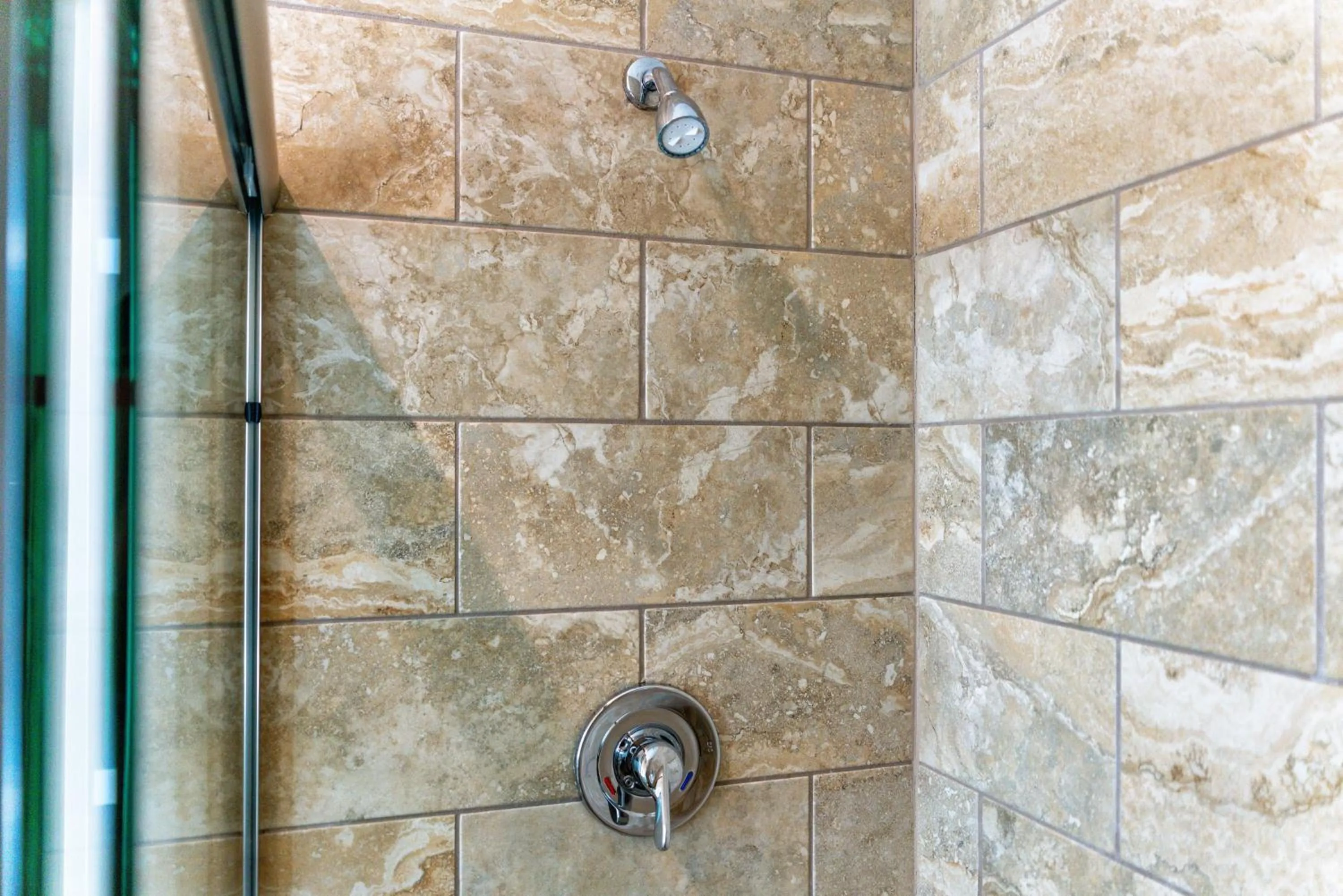 Shower in Waterside Suites and Marina