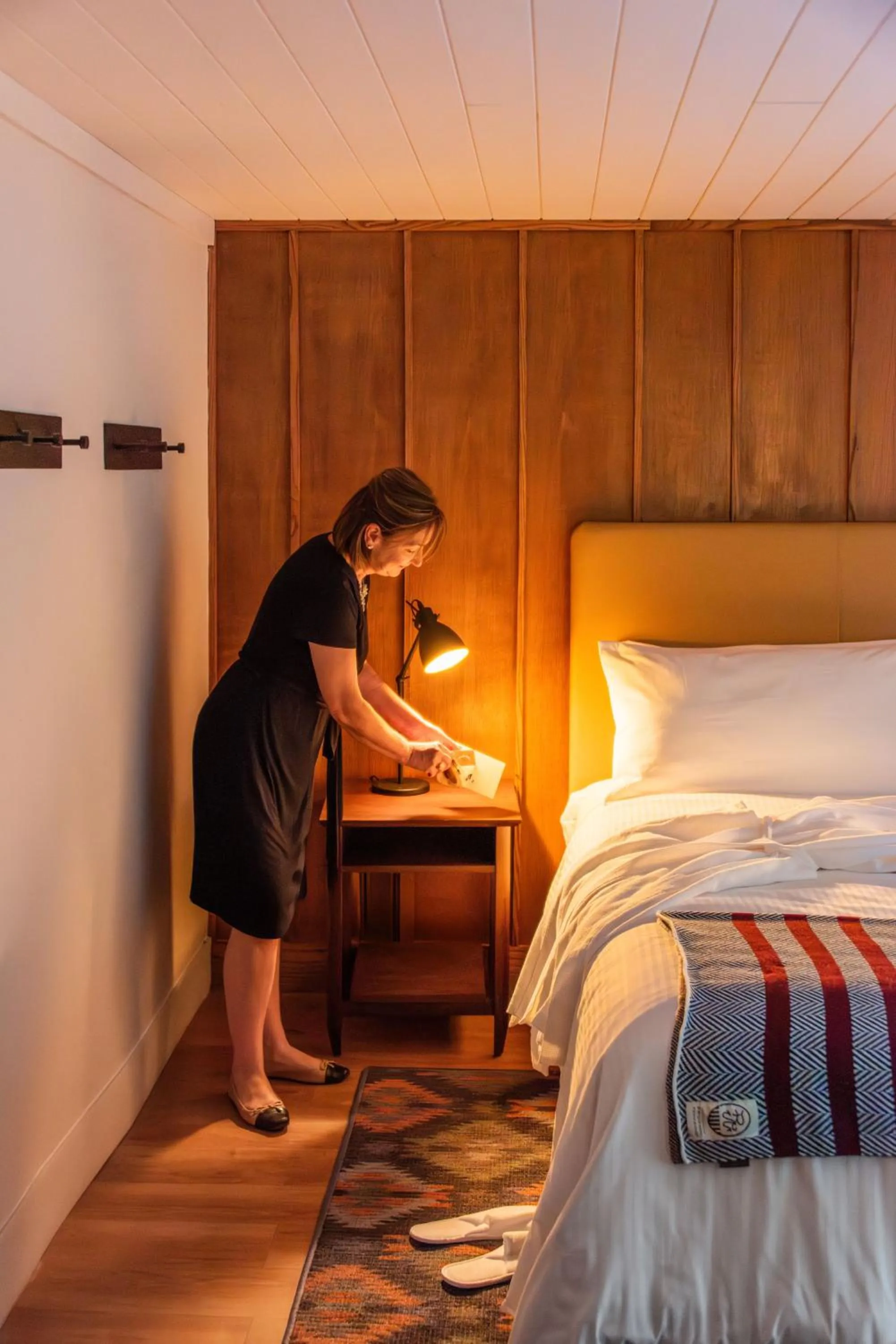 Bed in Historic Rocky Waters Inn, A Small Luxury Hotel