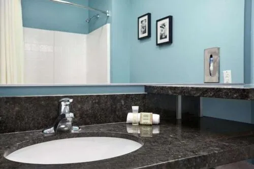 Bathroom in Super 8 by Wyndham Indio