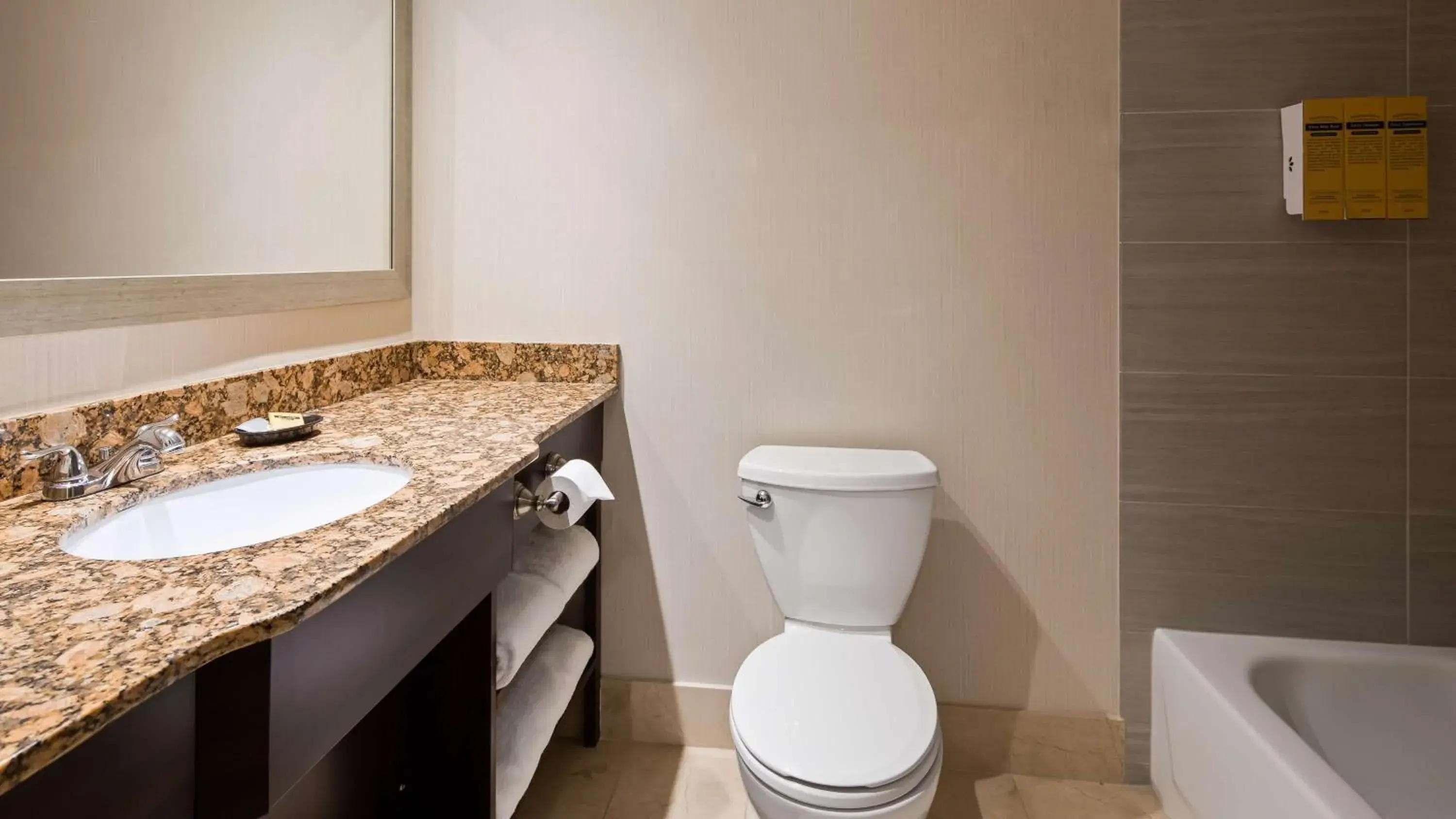 Bathroom in Best Western Plus Ambassador Suites Bathroom in Best Western Plus Ambassador Suites