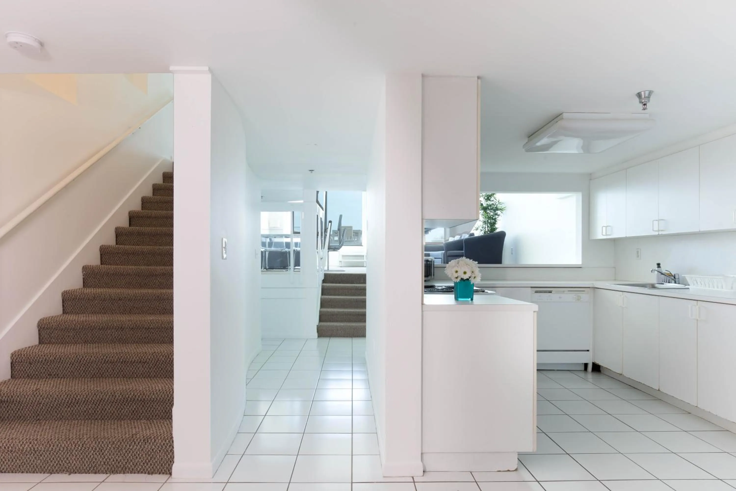 Kitchen or kitchenette in New Point Miami Beach Apartments