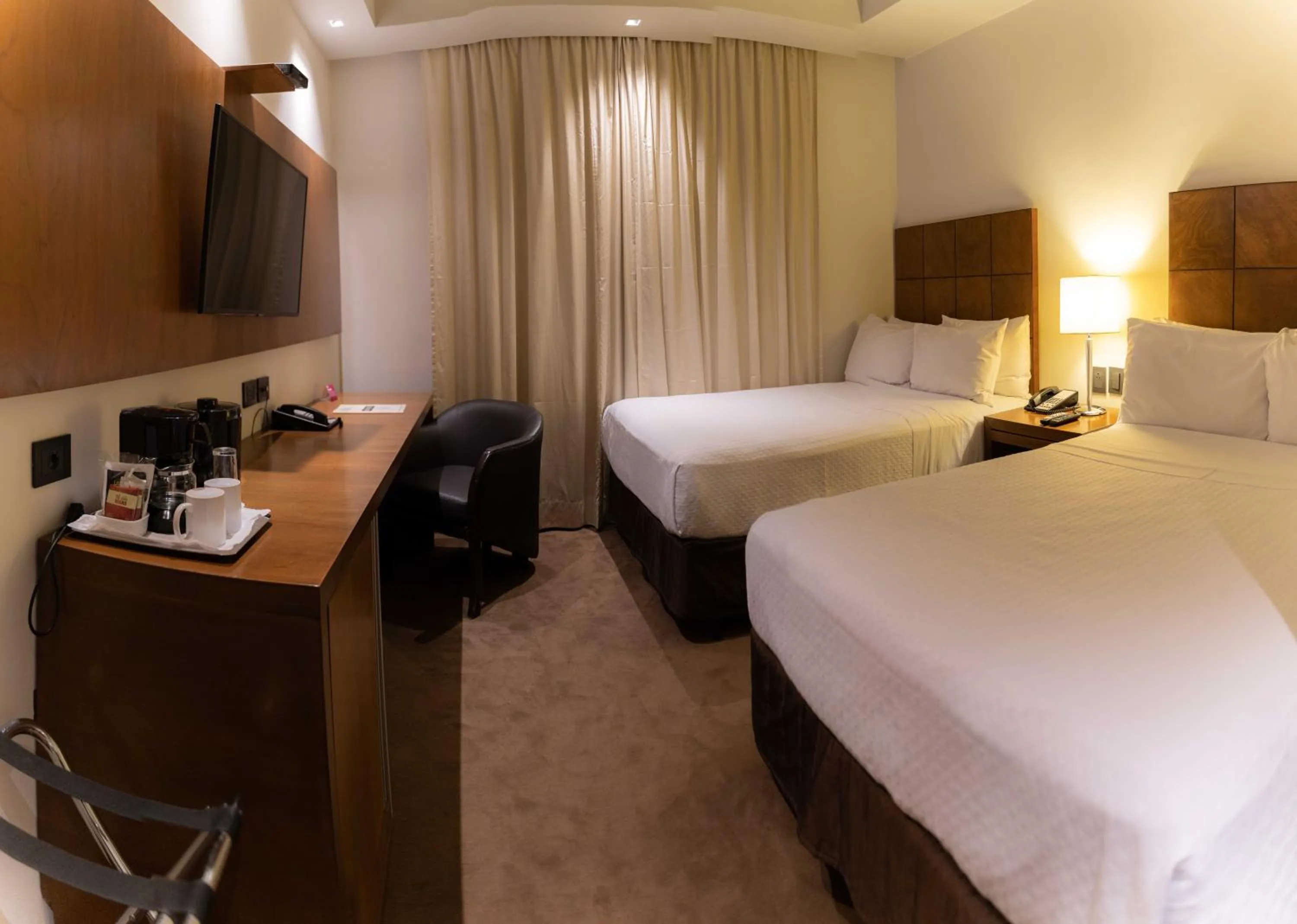 Photo of the whole room, Bed in Crowne Plaza Asunción by IHG