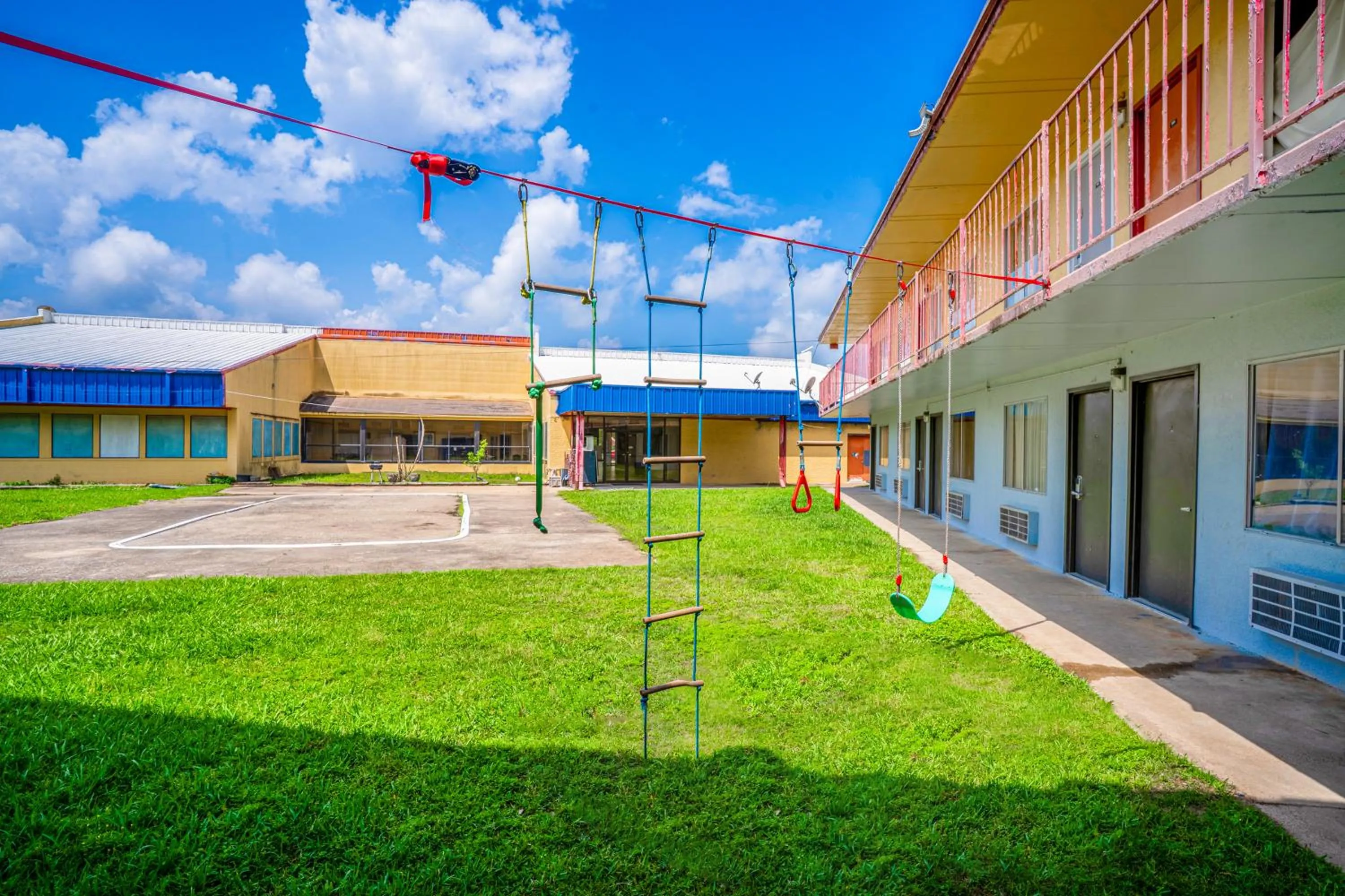 Property building in Economy Inn By OYO Livingston TX Hwy 59