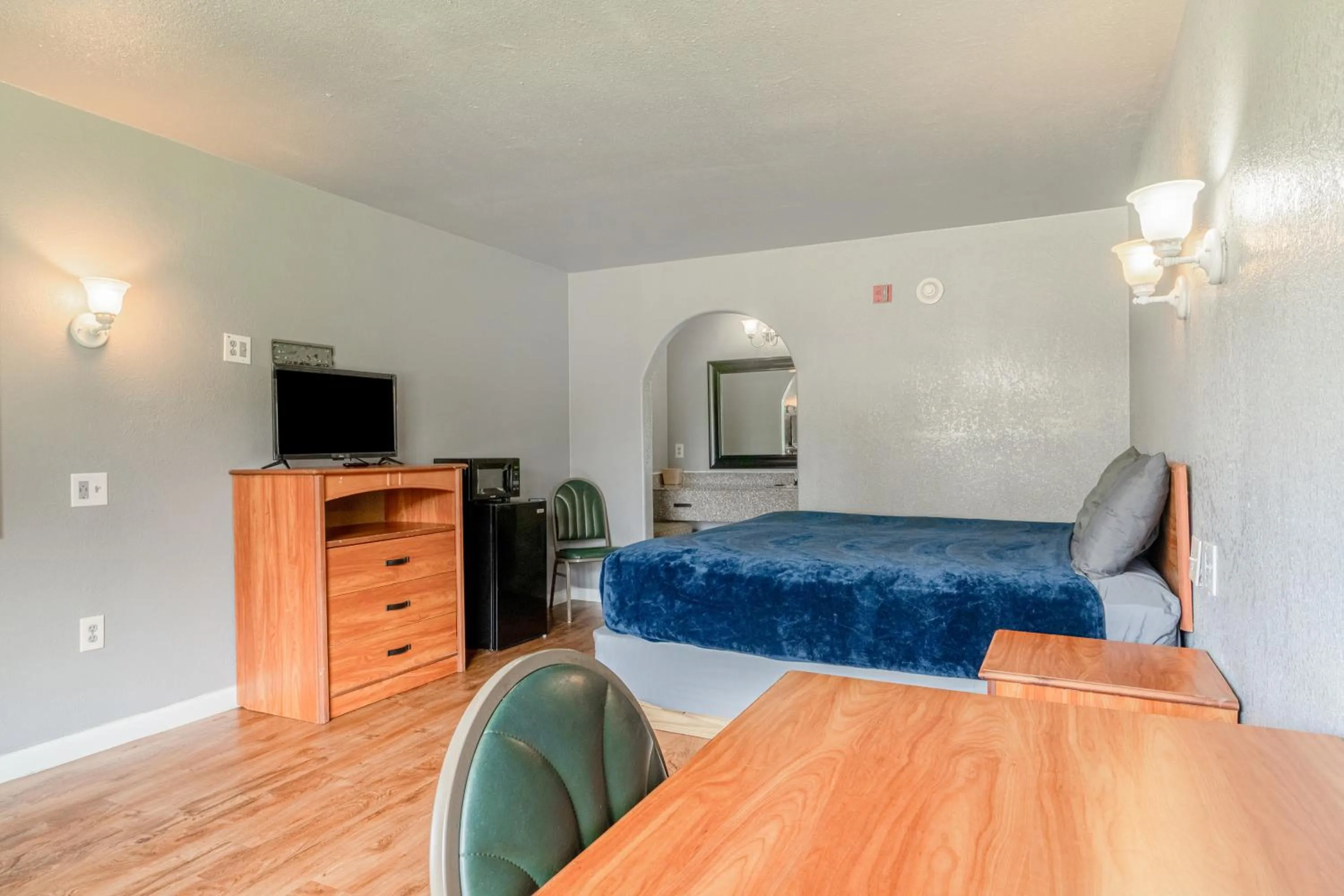 Bedroom in Economy Inn By OYO Livingston TX Hwy 59