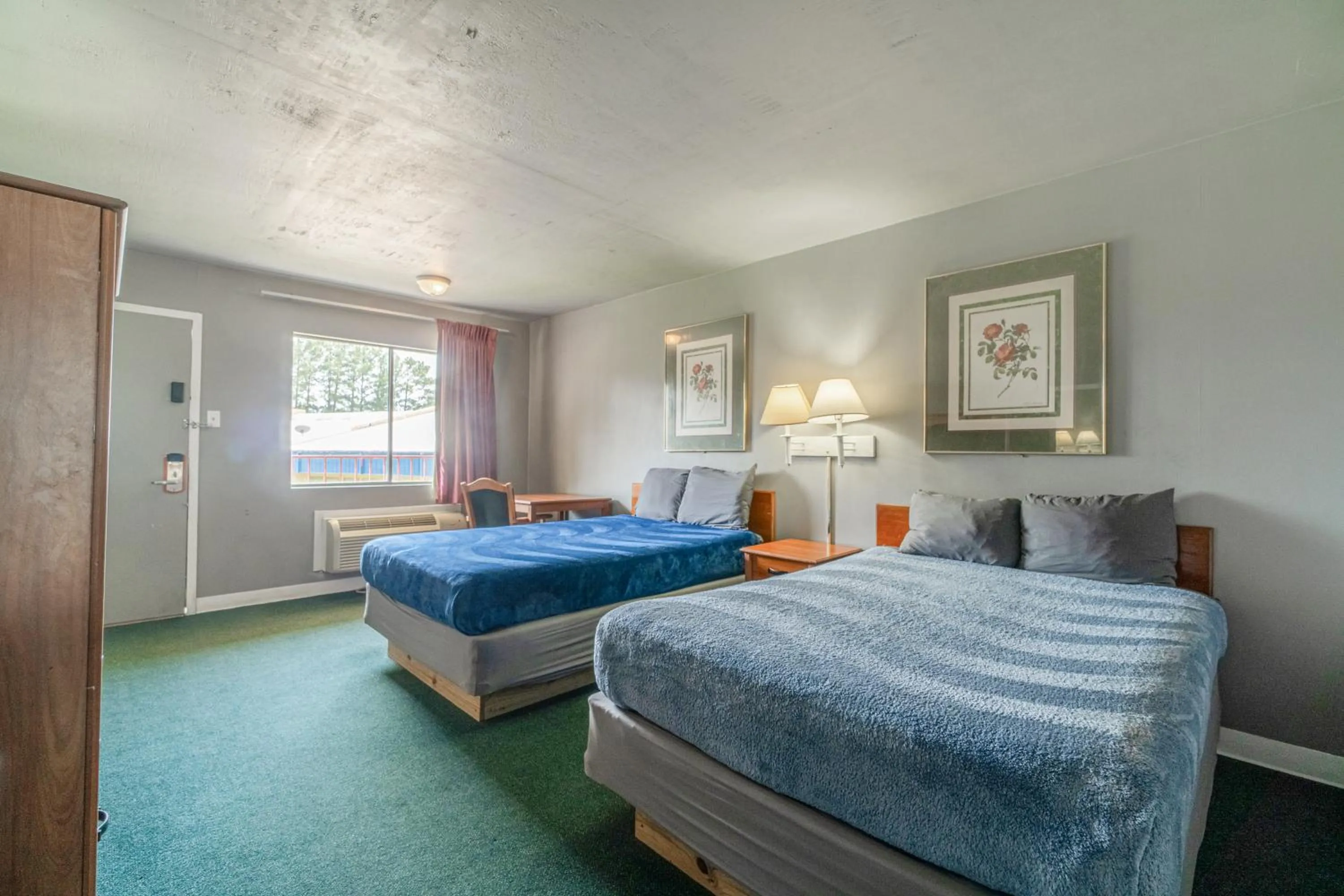 Bedroom, Bed in Economy Inn By OYO Livingston TX Hwy 59